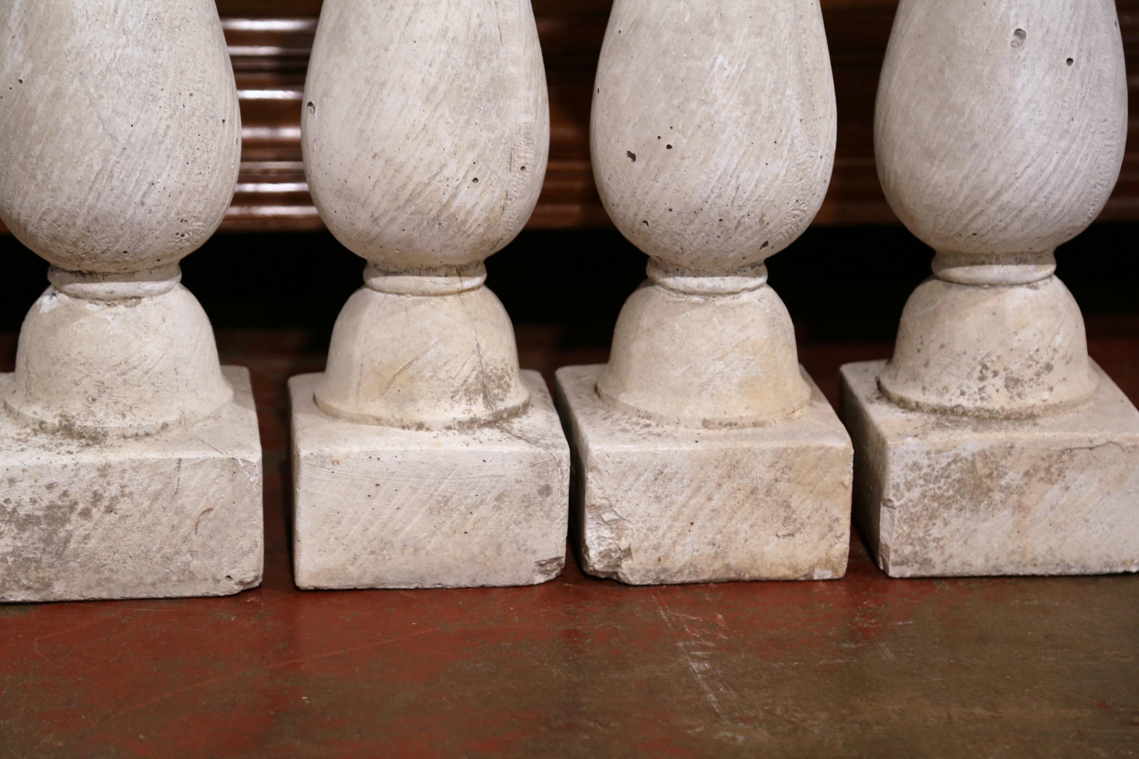 Cast Stone Set of Four French 19th Century Patinated Carved Stone Balusters