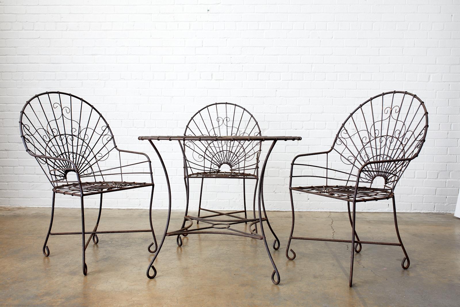 Hand-Crafted Set of Four French Art Nouveau Iron Garden Chairs