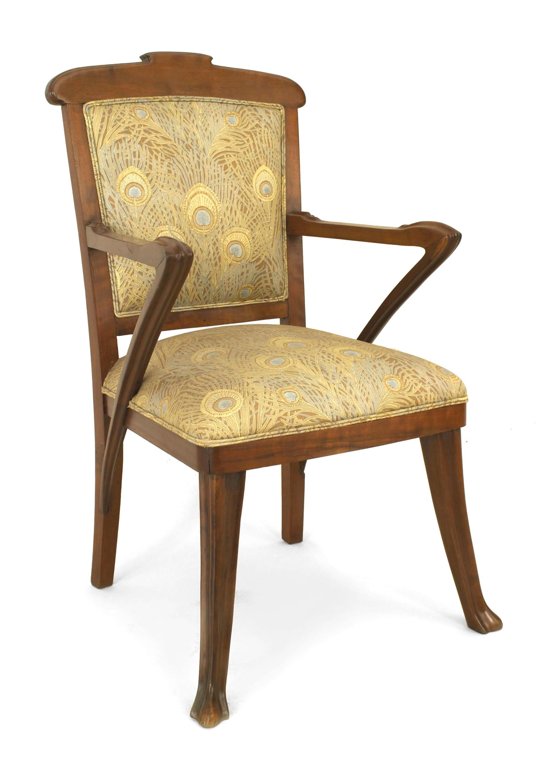 Set of 4 French Art Nouveau walnut open armchairs with upholstered peacock feather design seats and backs. (PRICED AS SET)
