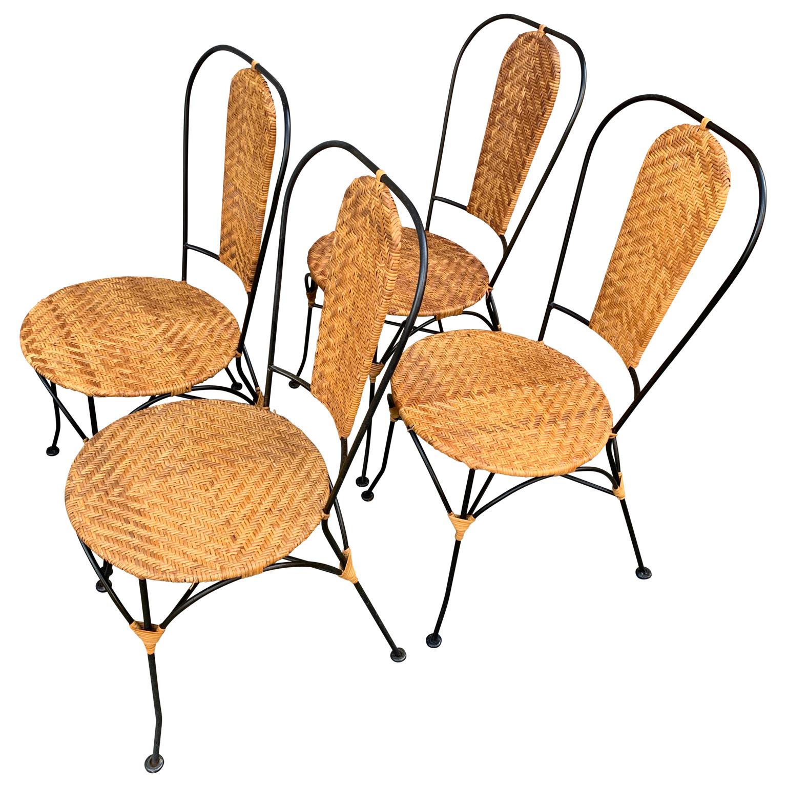 20th Century Set of Four French Black Painted Metal and Wicker Patio Cafe Chairs For Sale
