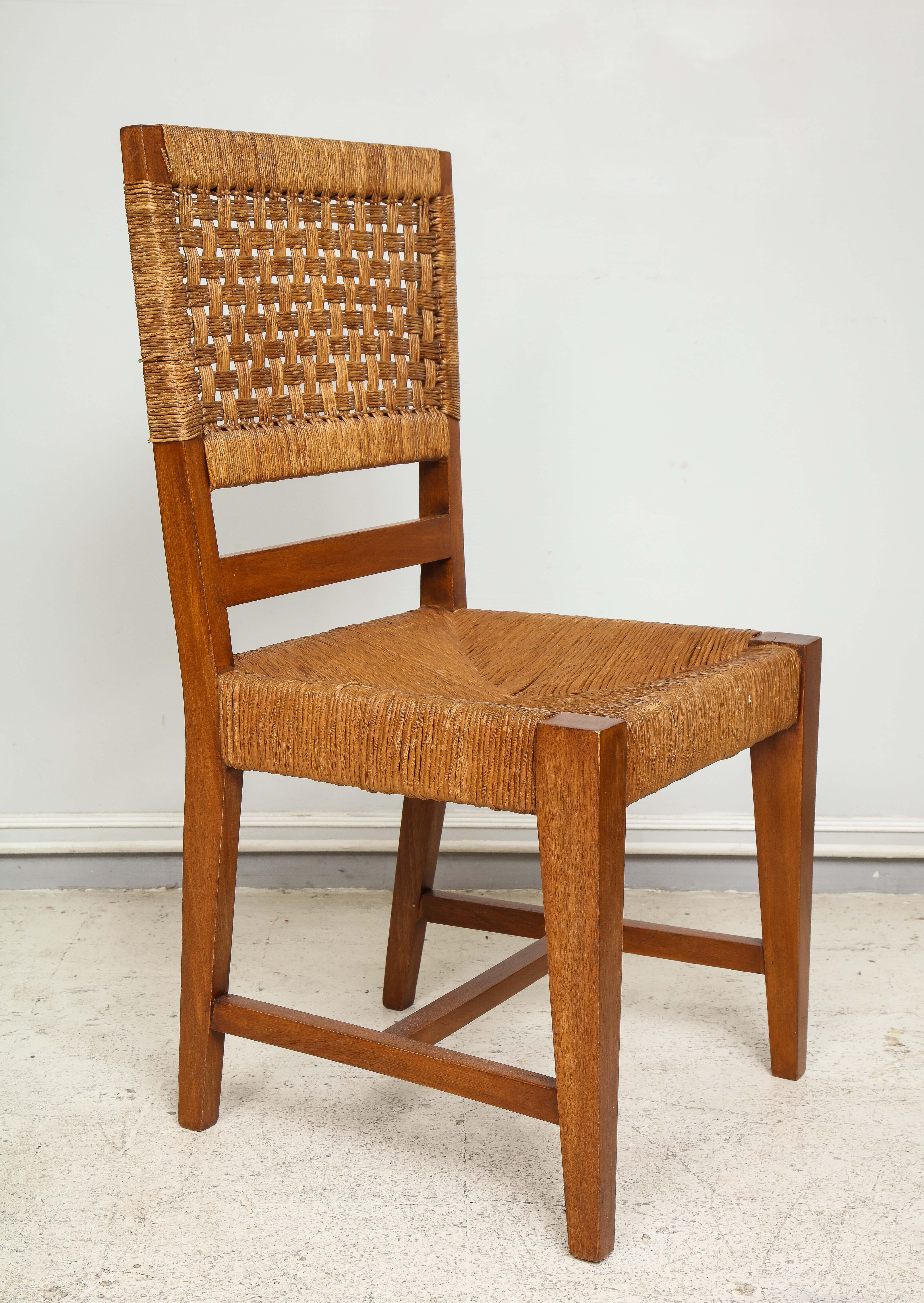 Set of four French caned chairs from circa 1940s-1950s.