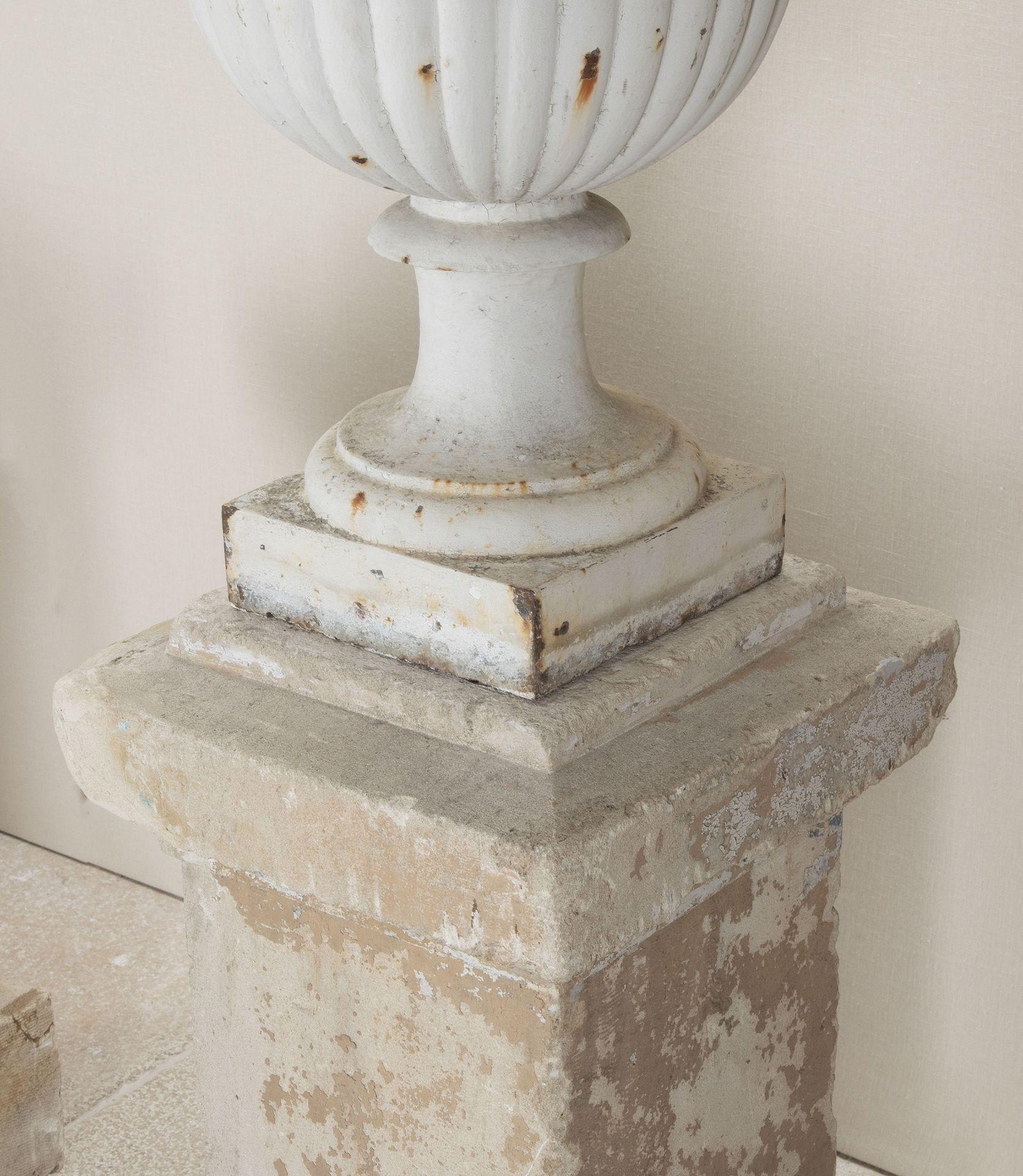 Set of Four French Cast Iron Urns on Stone Plinths For Sale 1
