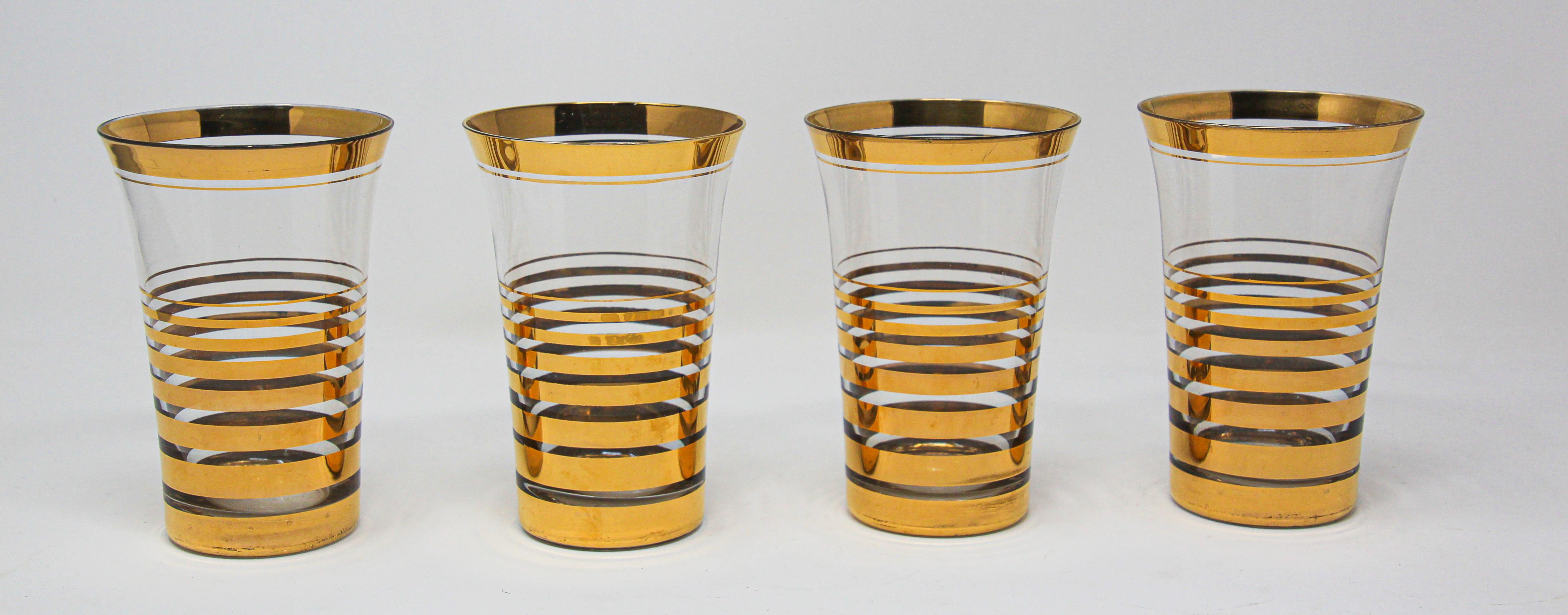 Elegant vintage French barware cocktail glasses with a pattern in a gold leaf finish.
Set includes 4 cocktail glasses in Moser style design.
This fabulous elegant set of barware with 22-carat gold decoration is decorated in a simple pattern in