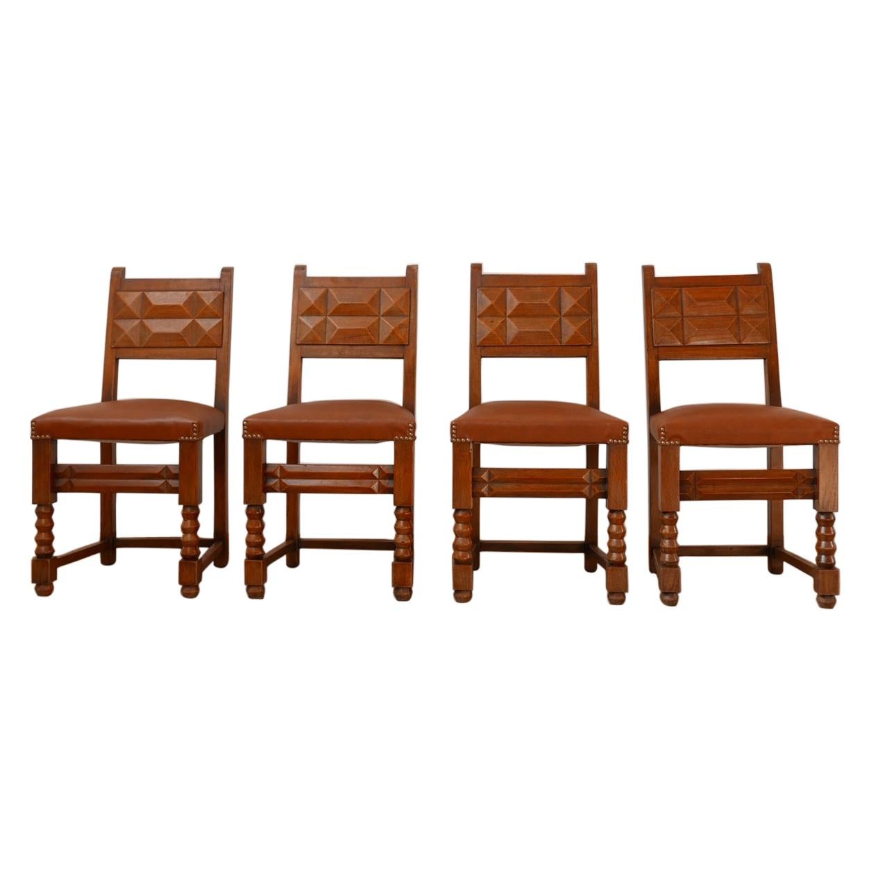 Ensemble de quatre chaises de salle à manger Art Déco françaises à la manière de Charles Dudouyt