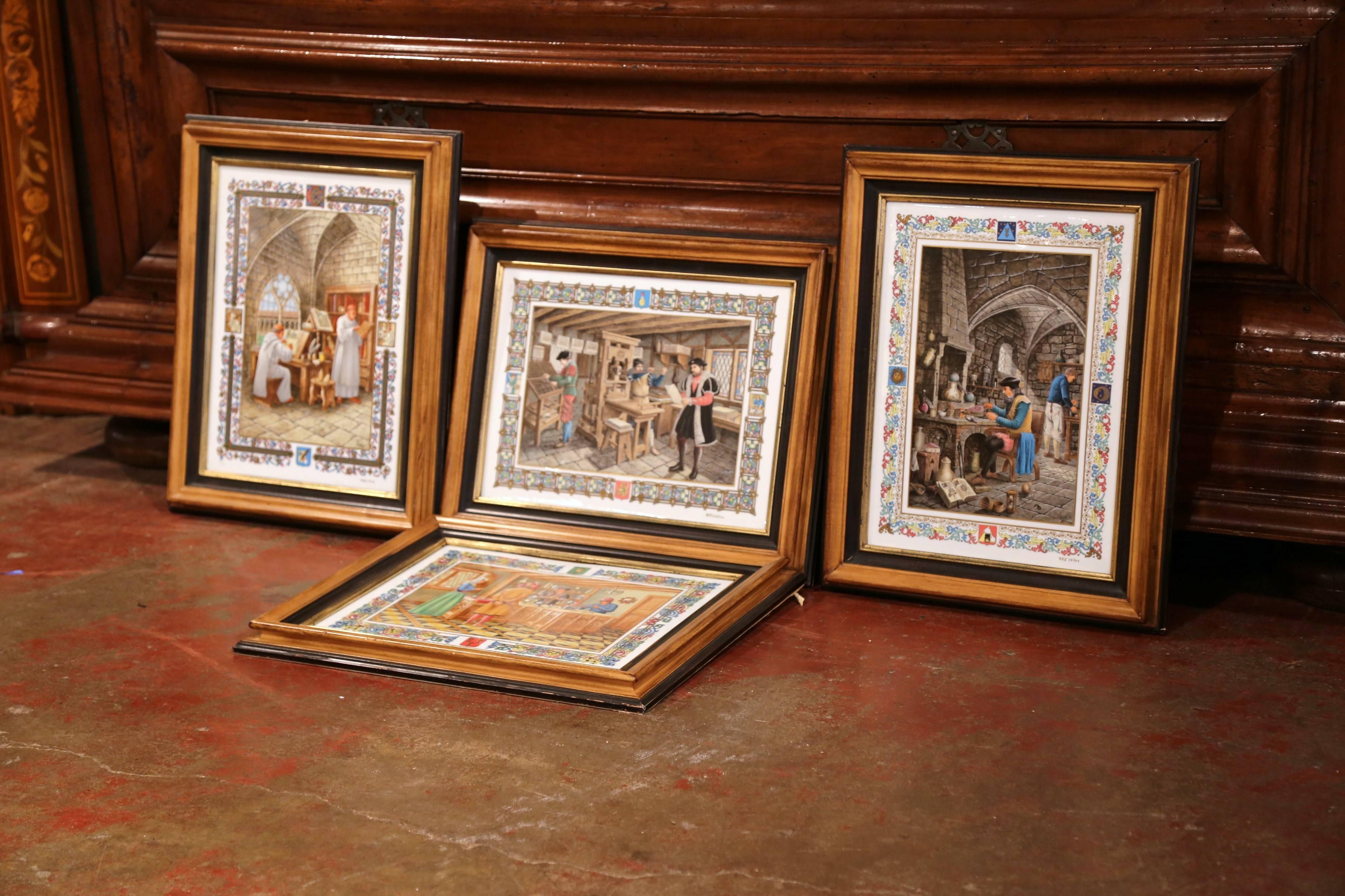 This elegant set of four porcelain plaques depict medieval work activities. Crafted in France, circa 1980, each colorful wall plaque illustrates different occupations available during the Middle Ages. The scenes show a goldsmith, jeweler, alchemist
