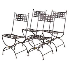 Set of Four French Iron Curule Side Chairs with Woven Strap Seats