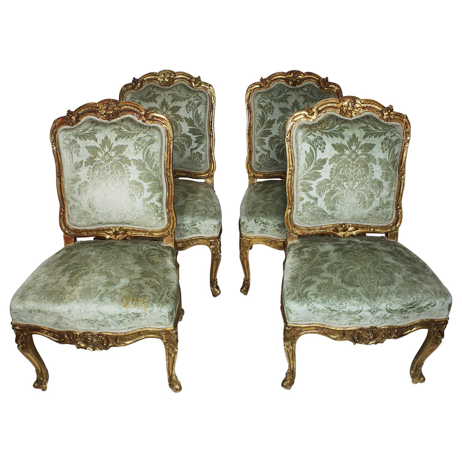 Set of Four French Louis XV Rococo Style Giltwood Carved Side Chairs For Sale