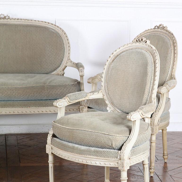 Hand-Carved Set of Four French Louis XVI Open Armchairs or Fauteuils For Sale