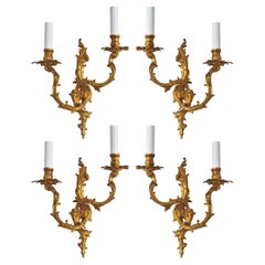Set of Four French Louis XVI Style Gilt Bronze Electrified Two-Light Sconces