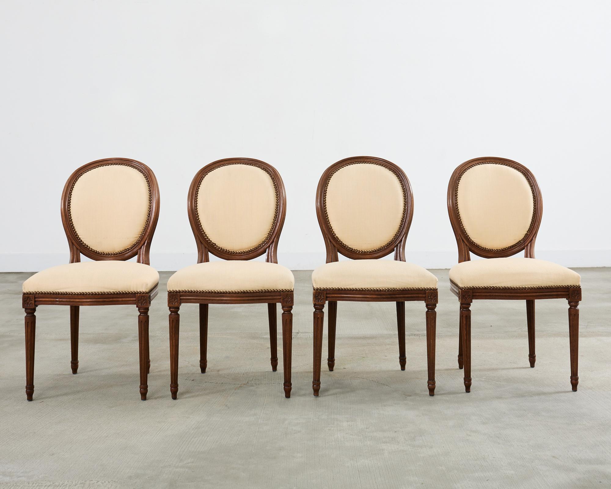 Hand-Crafted Set of Four French Louis XVI Style Oak Dining Chairs For Sale