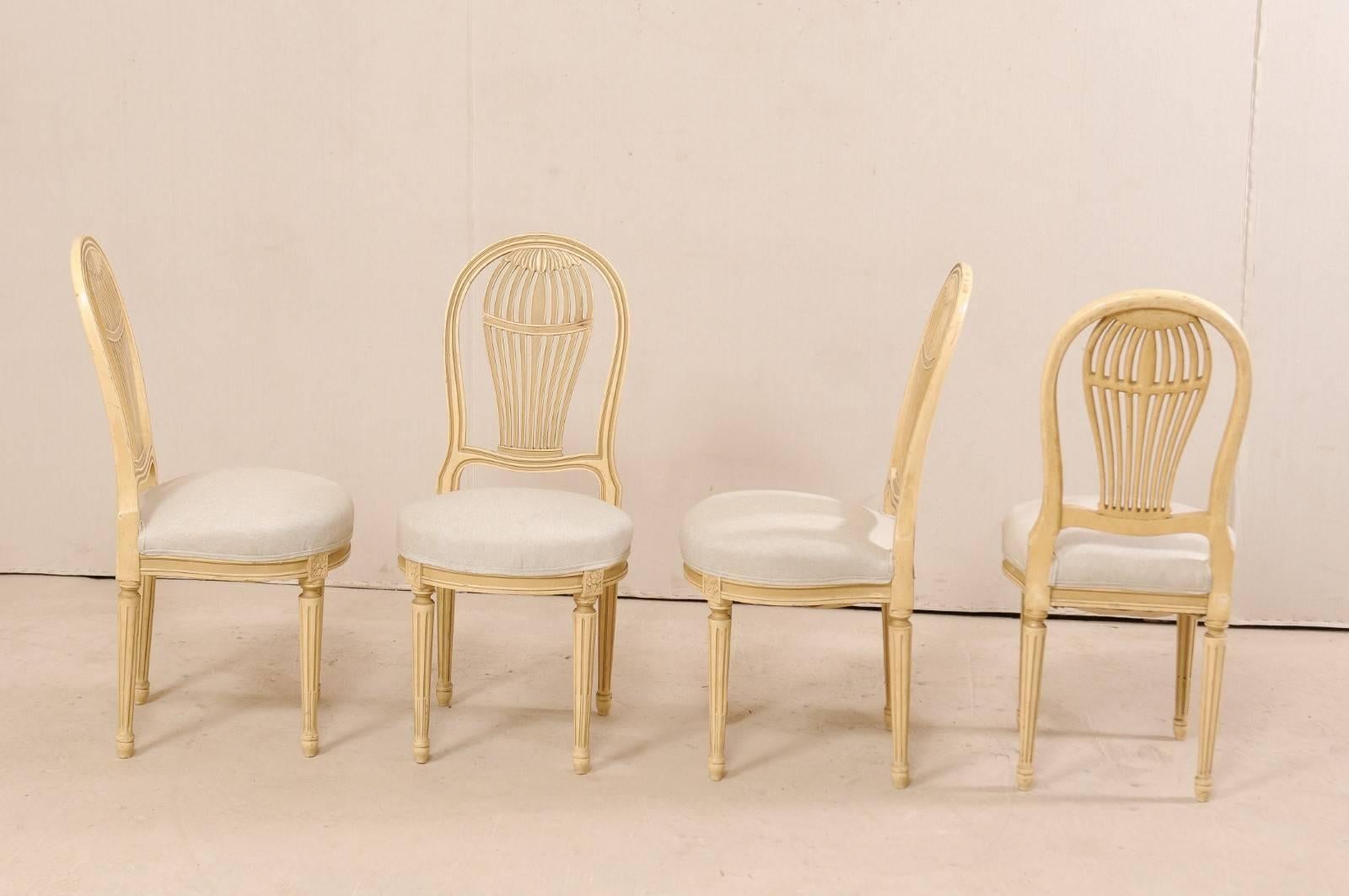 Set of Four French Louis XVI Style Painted Wood Balloon-Back Chairs (Louis XVI.)