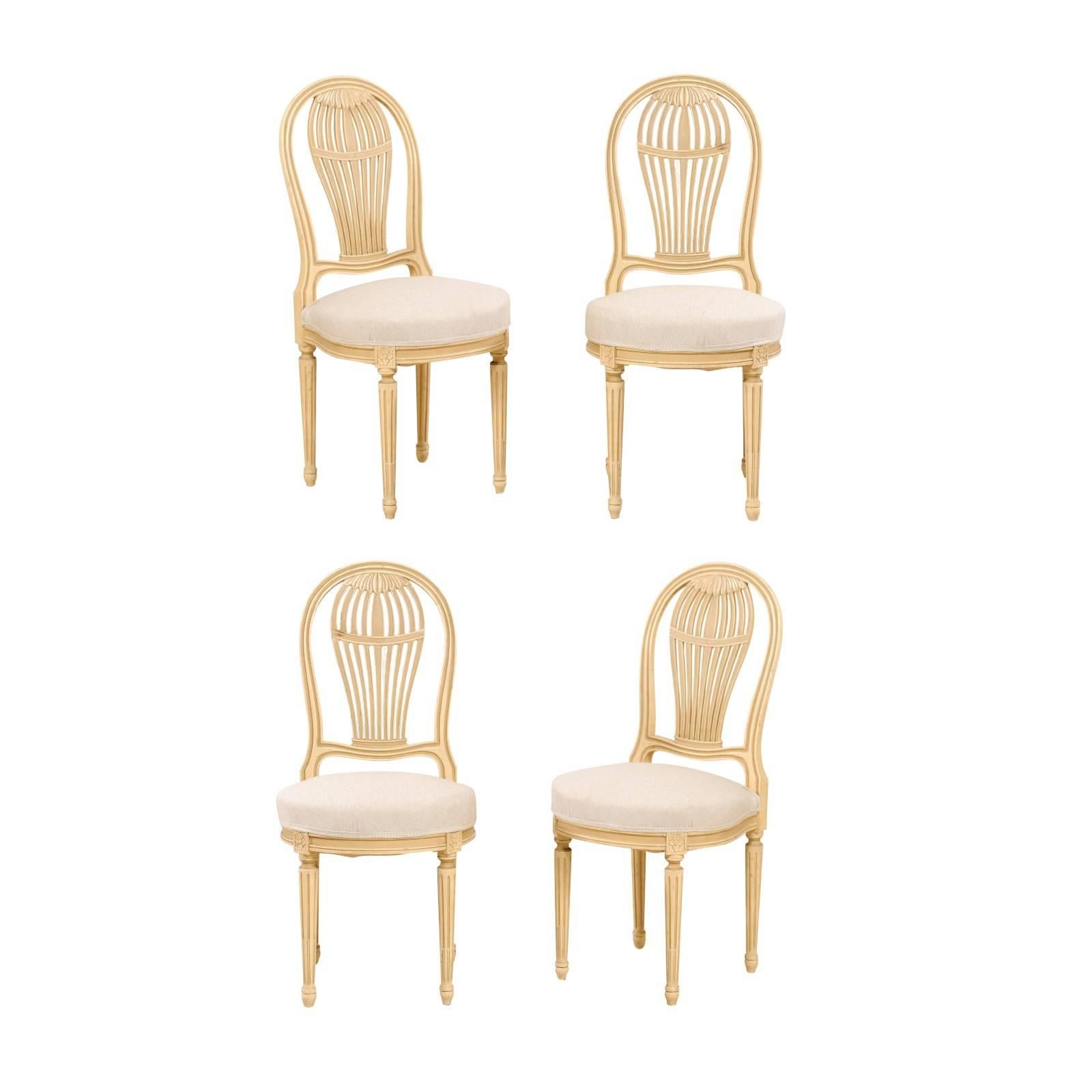 Set of Four French Louis XVI Style Painted Wood Balloon-Back Chairs