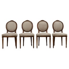 Set of Four French Louis XVI Style Walnut Dining Chairs