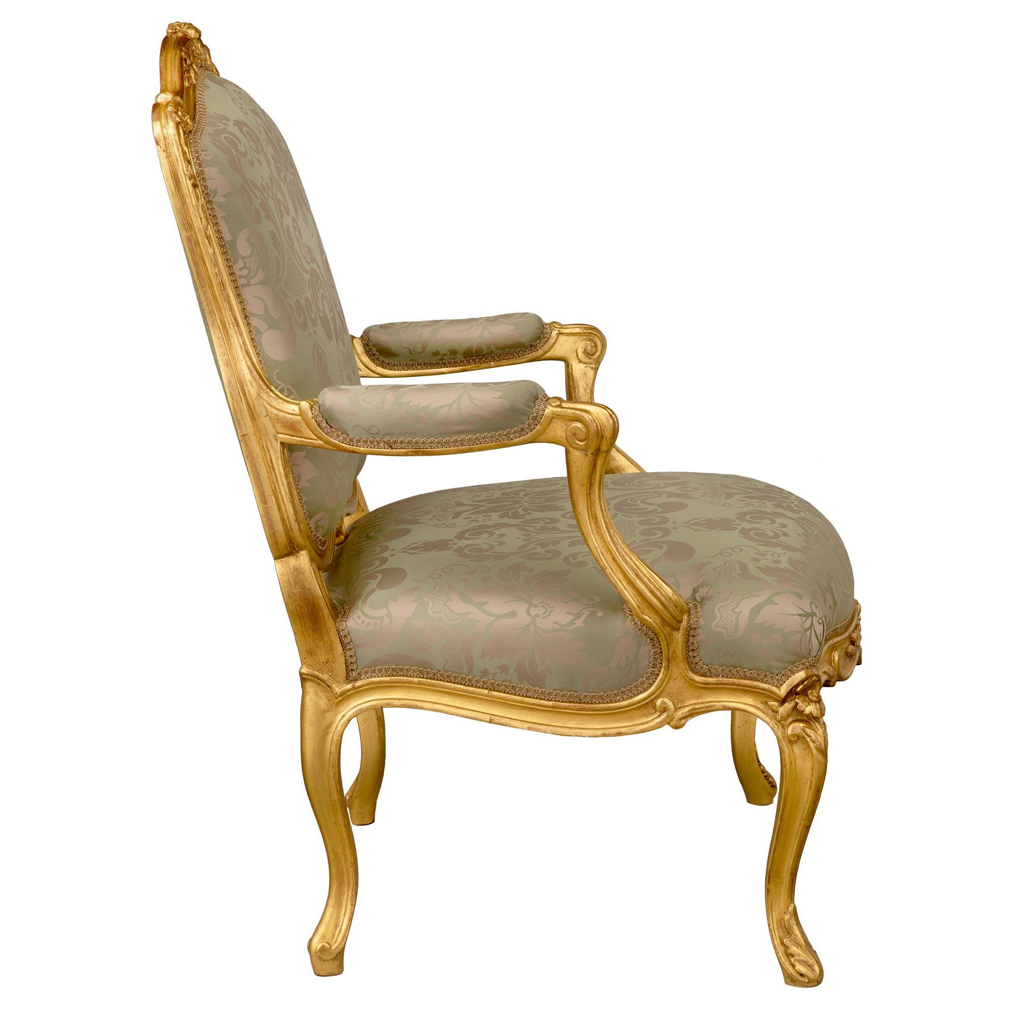 Set of Four French Mid-19th Century Louis XV Style Giltwood Armchairs For Sale 1