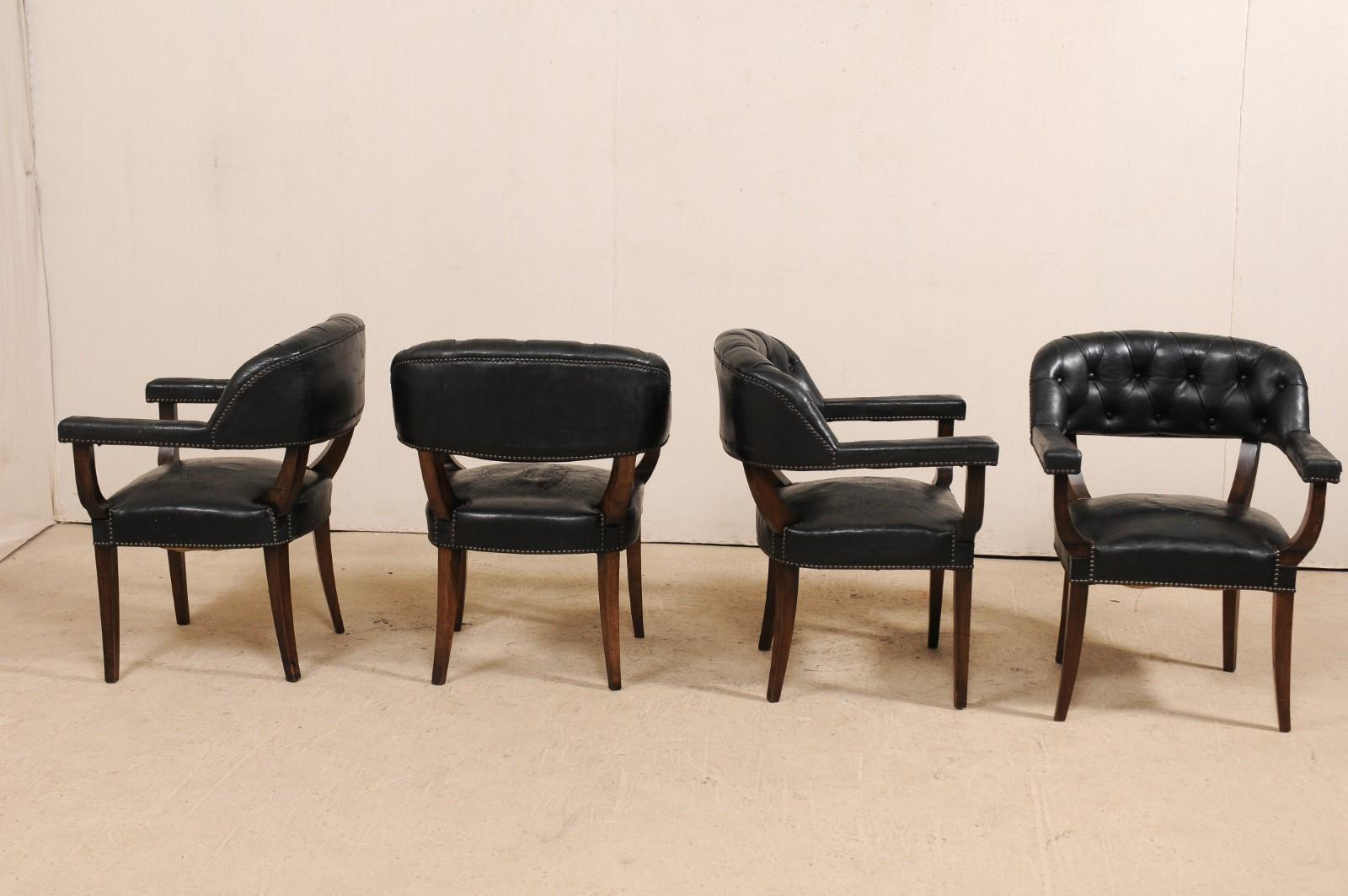 Set of Four French Mid-20th Century Black Leather Tub Armchairs In Good Condition For Sale In Atlanta, GA