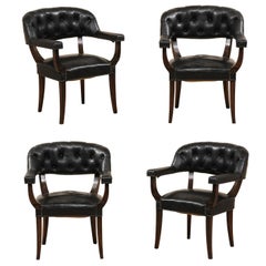 Set of Four French Mid-20th Century Black Leather Tub Armchairs