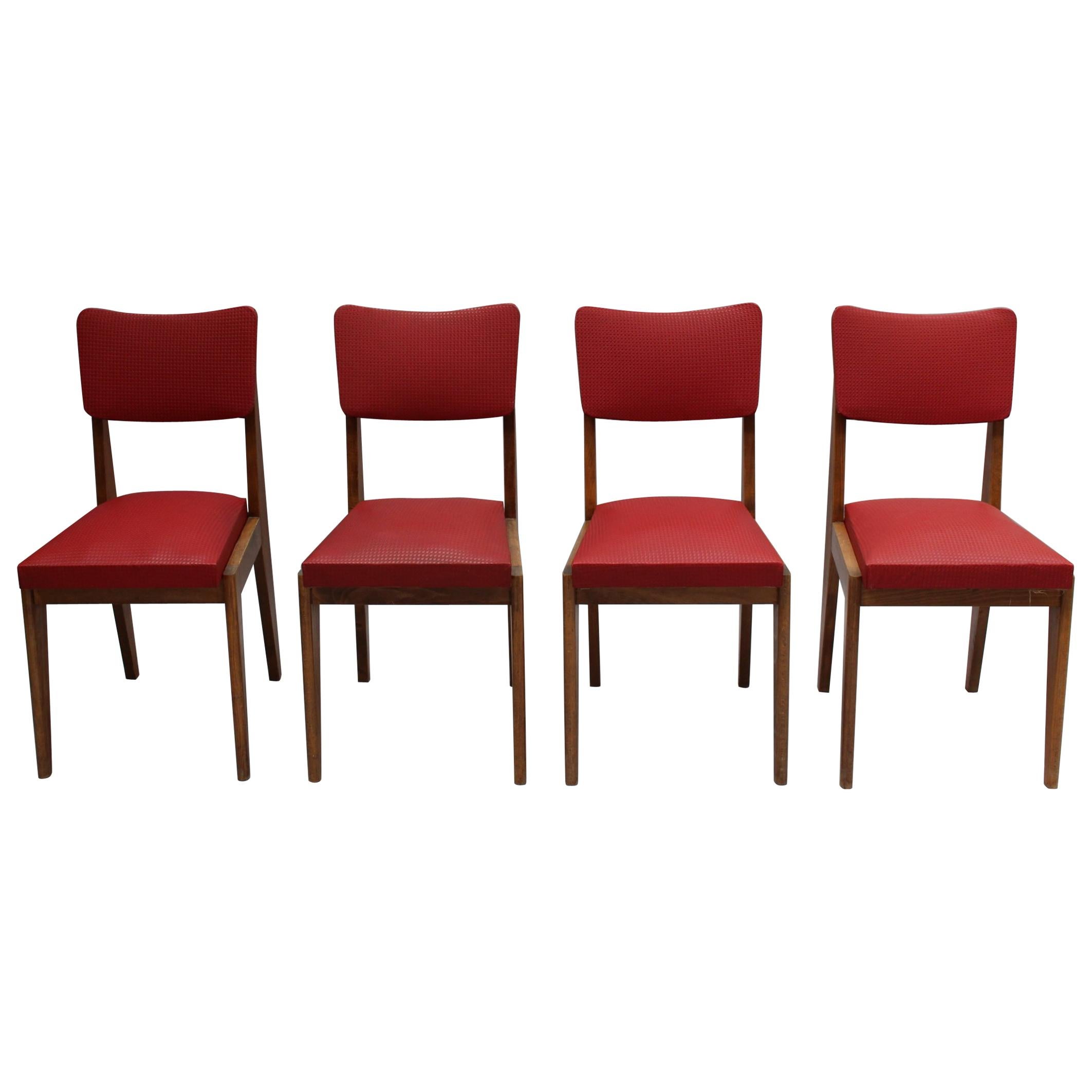 Ensemble de quatre chaises françaises du milieu du siècle dernier