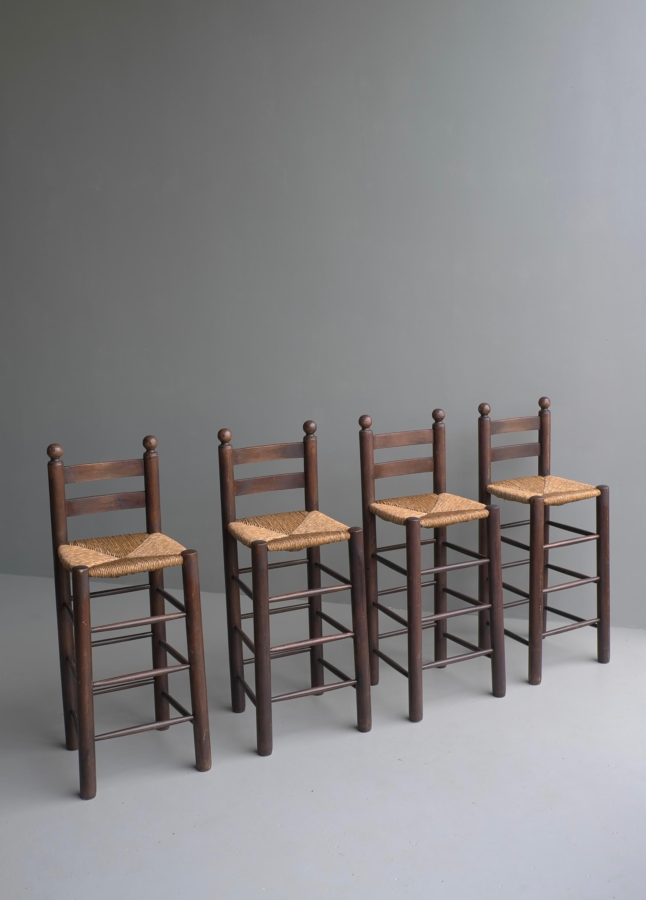 Mid-Century Modern Set of Four French Oak Barstools with Rush Seats in Style of Charles Dudouyt