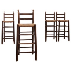 Set of Four French Oak Barstools with Rush Seats in Style of Charles Dudouyt