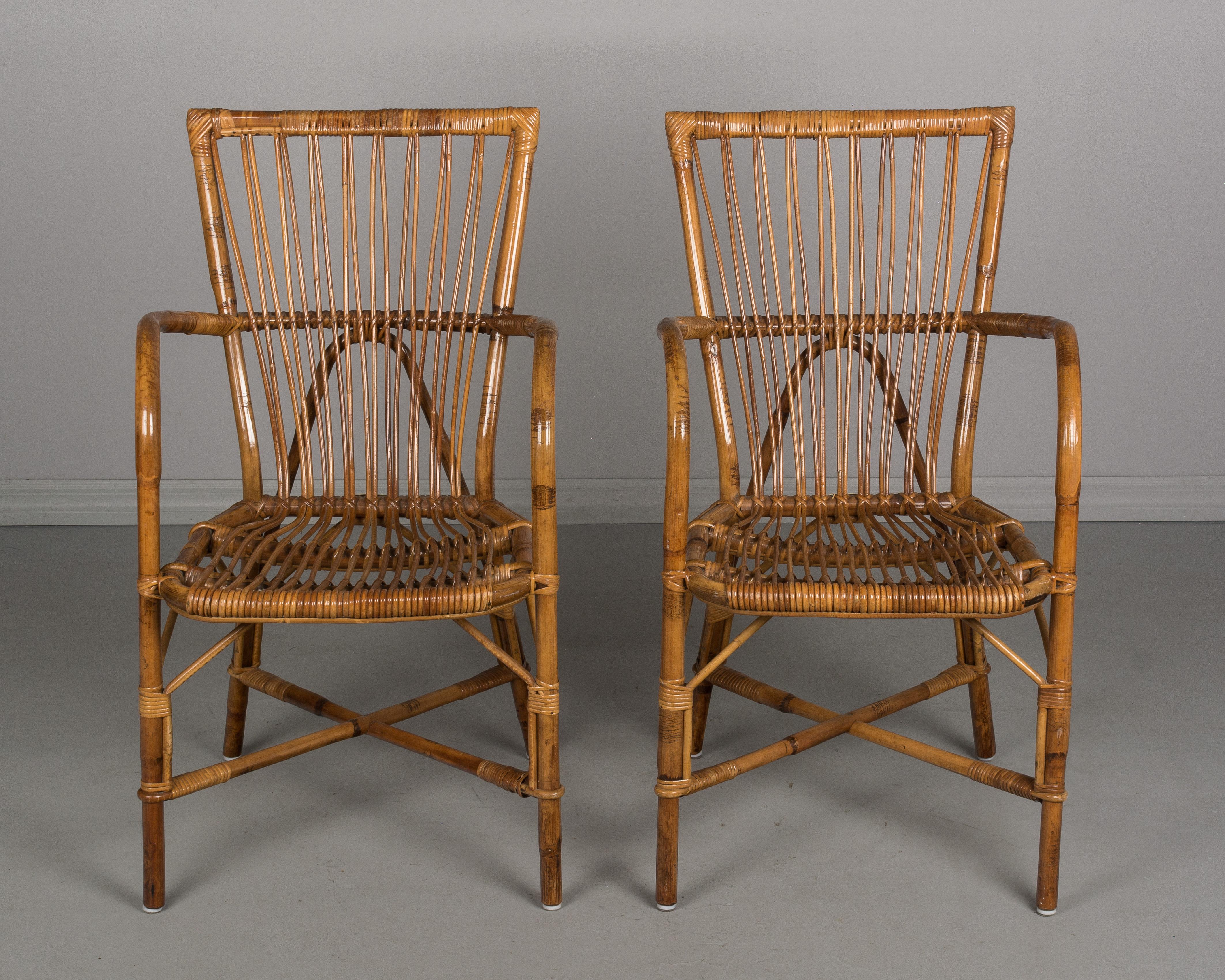 Mid-Century Modern Set of Four French Rattan Dining Chairs