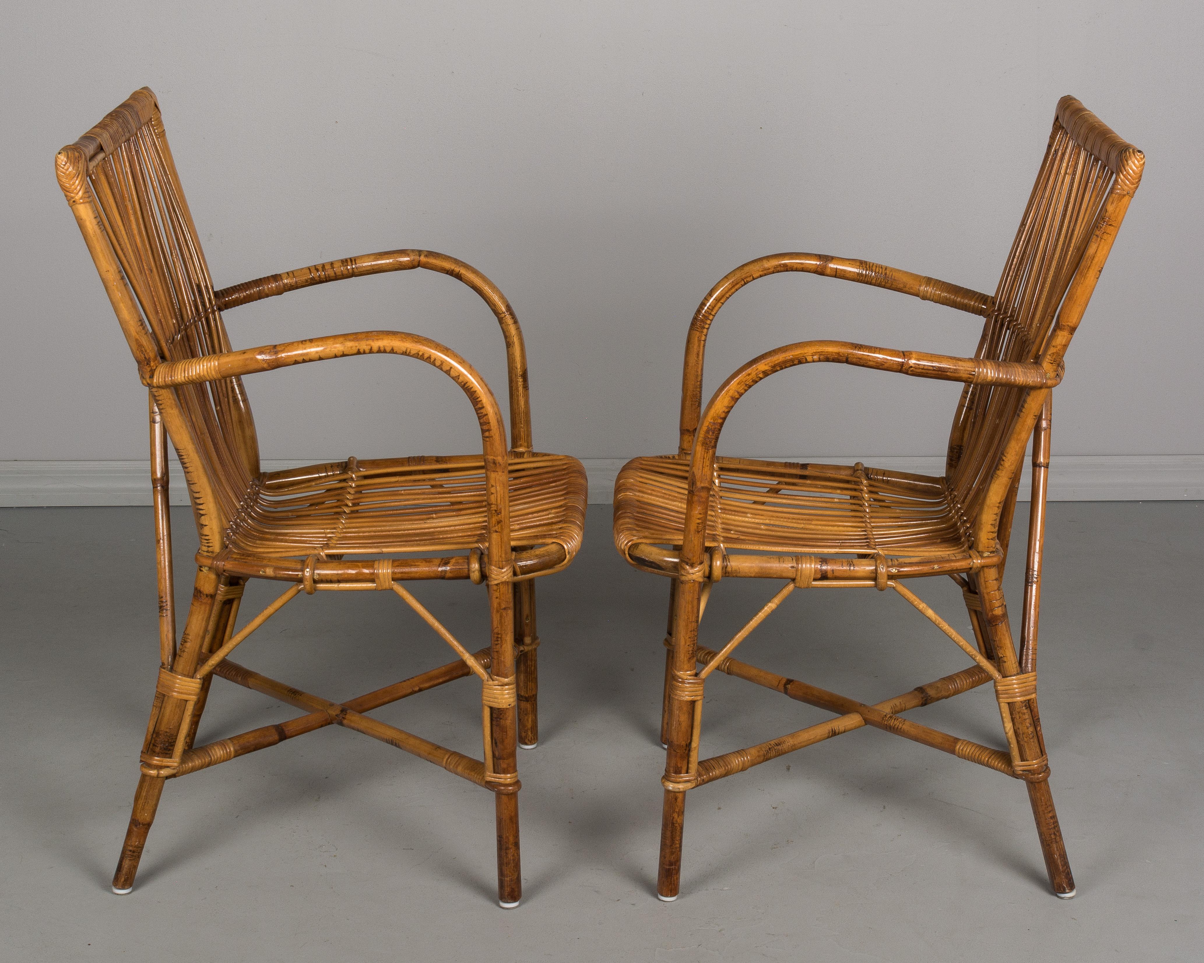 20th Century Set of Four French Rattan Dining Chairs