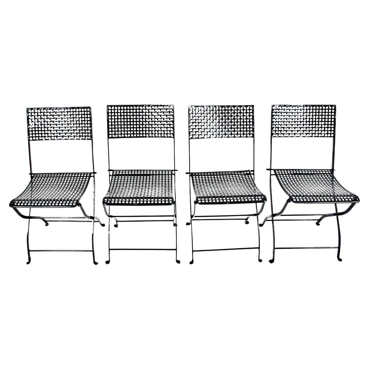 Set of 4 French Style Woven Black Enameled Iron  Folding Bistro Chairs, C. 1930  For Sale