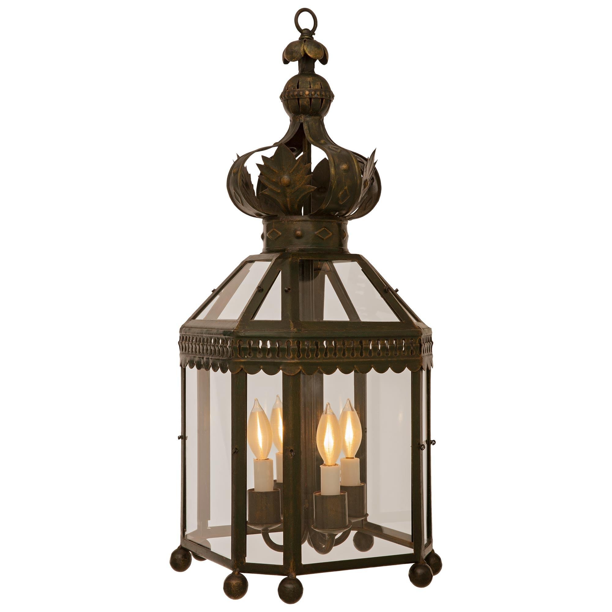 Set Of Four French Turn Of The Century Louis XVI St. Wrought Iron Lanterns In Good Condition For Sale In West Palm Beach, FL