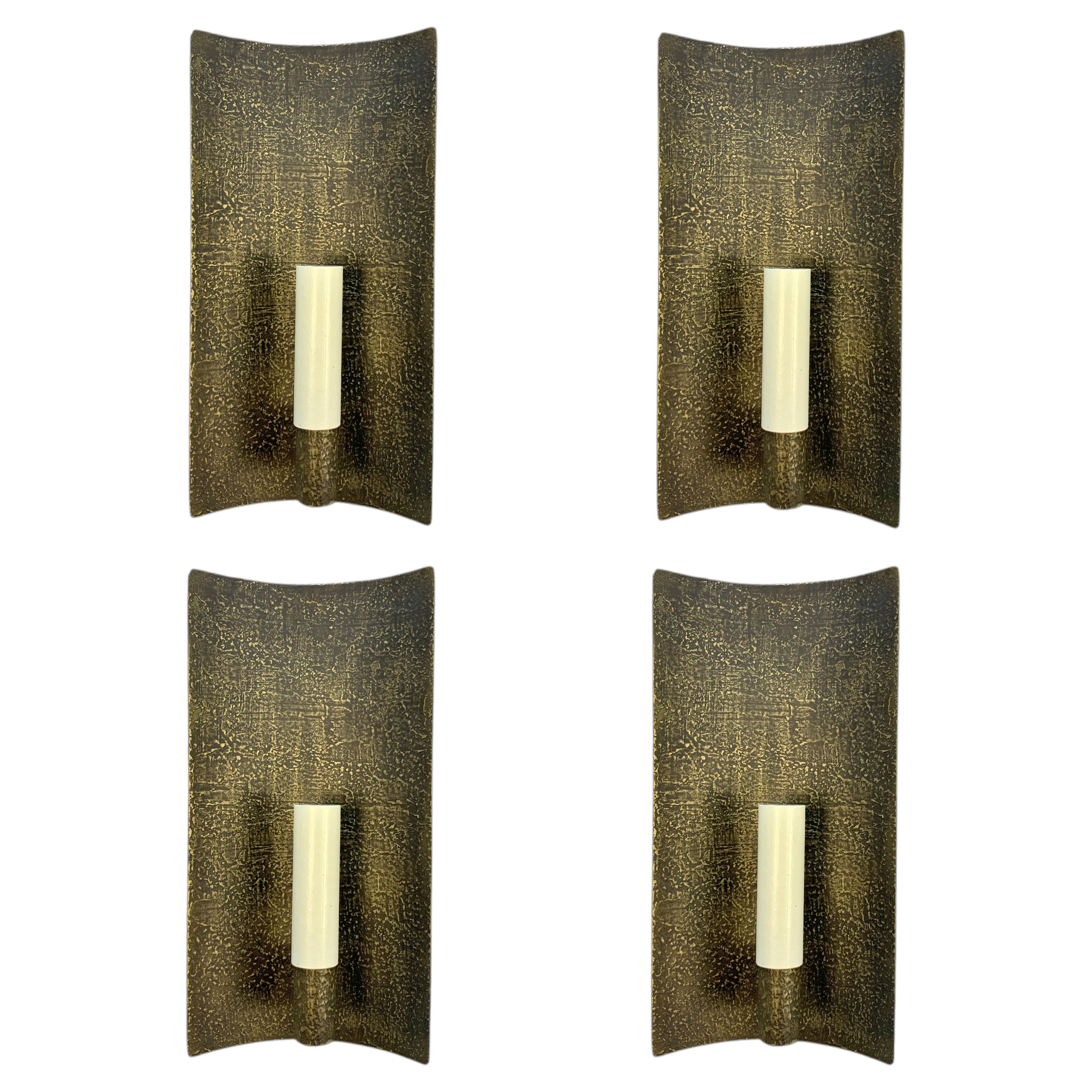 Set Of Four French Wall Lights In A Beaten Brass Finish For Sale