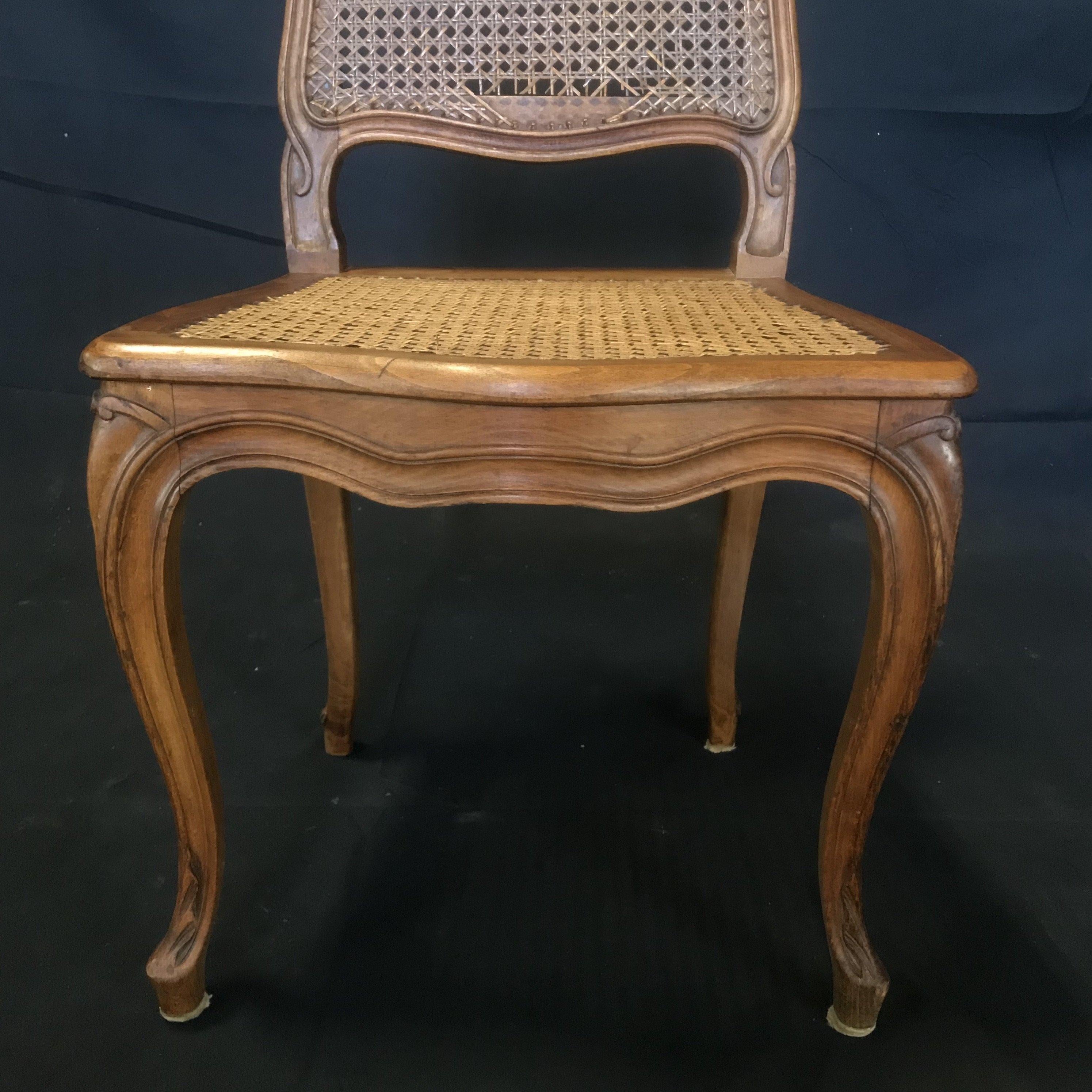 Set of Four French Walnut Carved Cane Dining Chairs For Sale 1