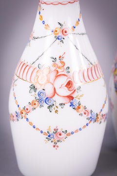 Set of Four French White Opaque Decanters and Stoppers, circa 1830