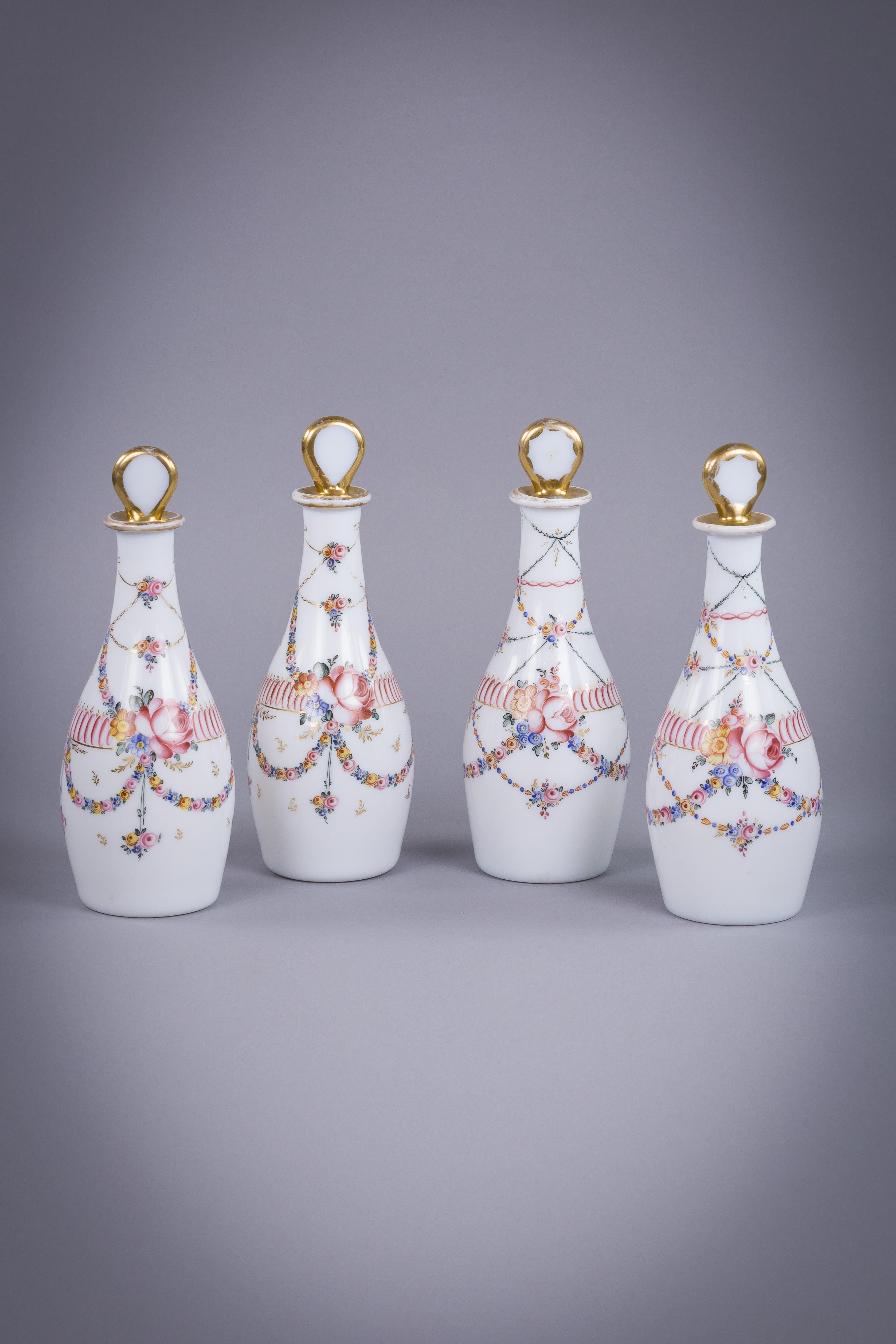 Mid-19th Century Set of Four French White Opaque Decanters and Stoppers, circa 1830 For Sale