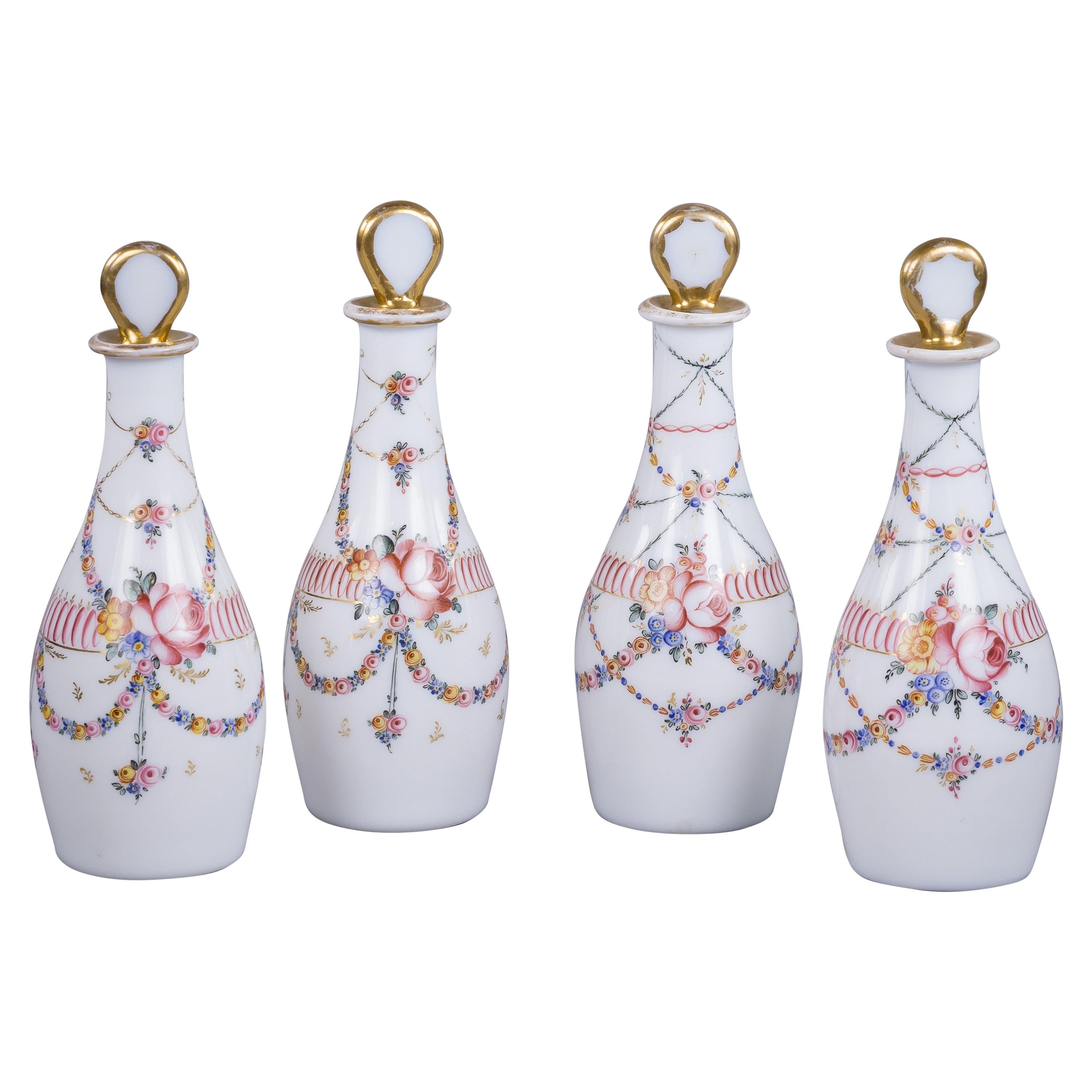 Set of Four French White Opaque Decanters and Stoppers, circa 1830 For Sale
