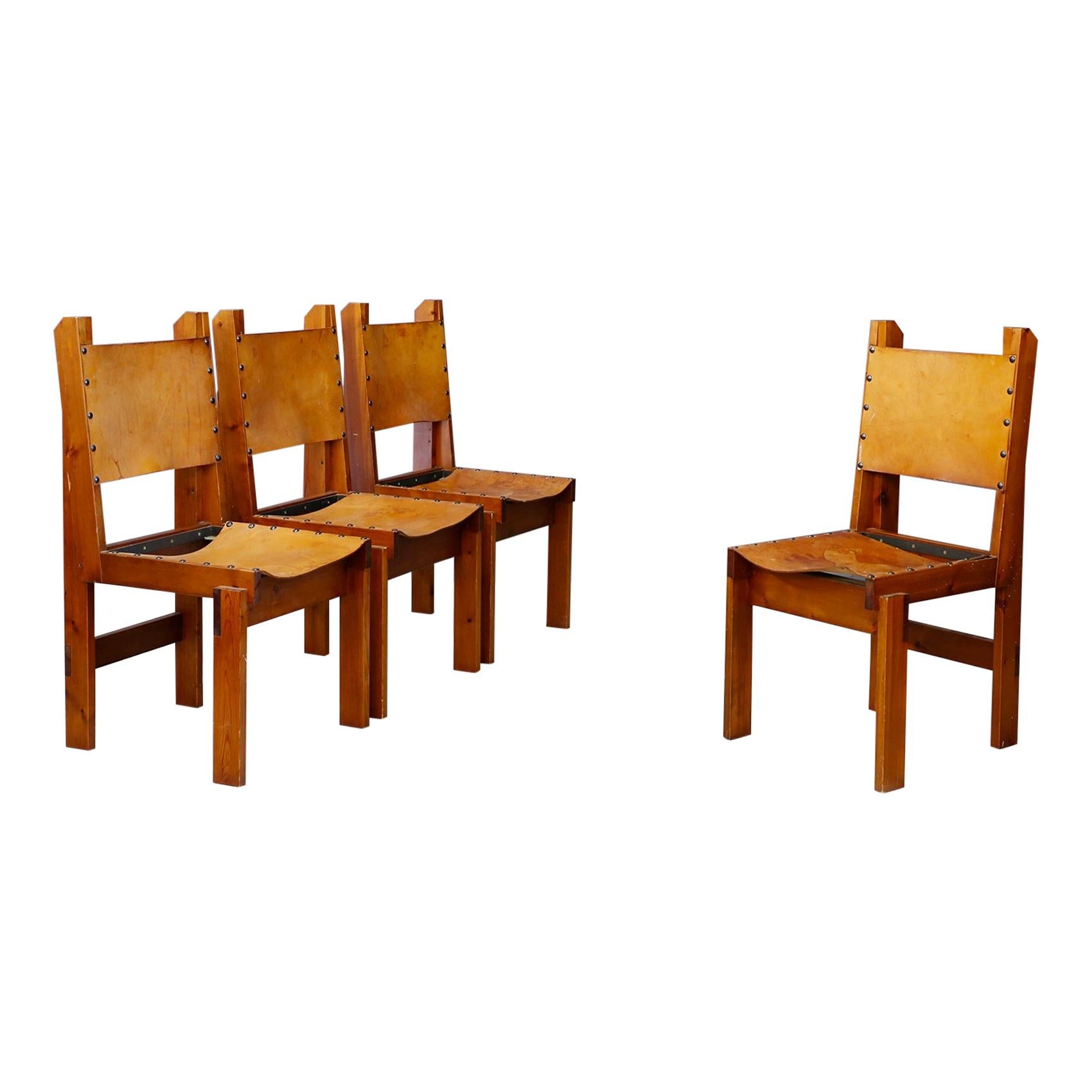 Set of Four French Wood and Leather Chairs in the Style of Pierre Chapo, 1960s