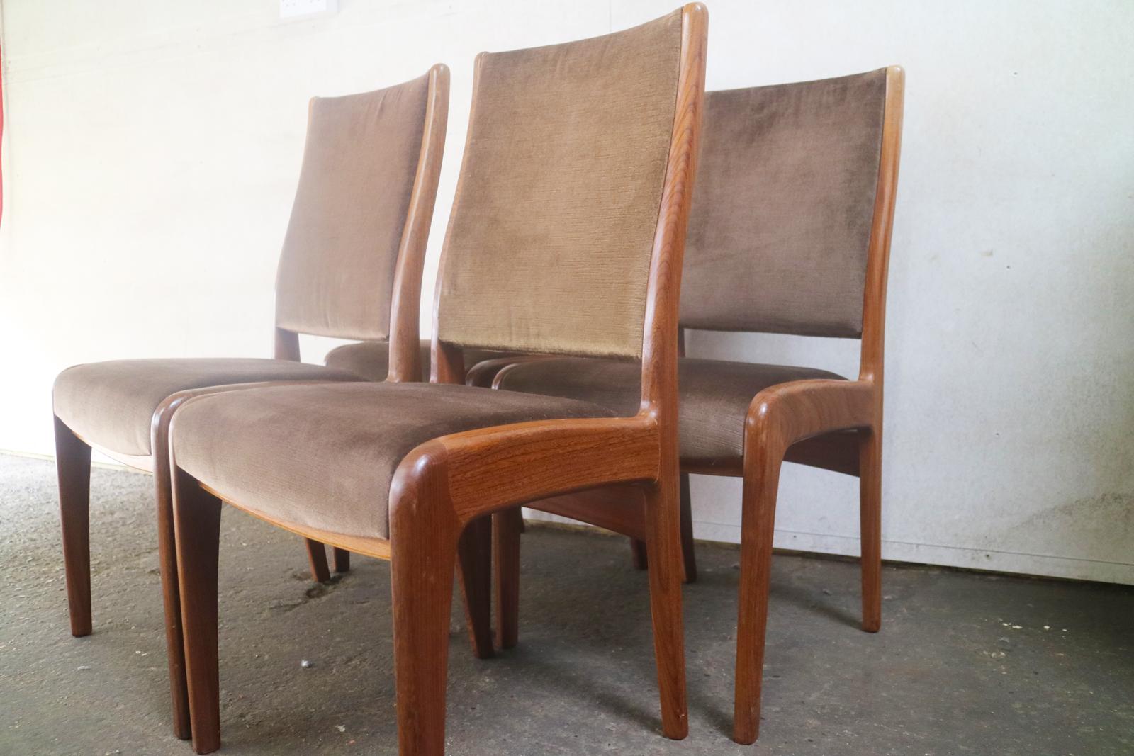 A very elegant set of dining chairs from G Plan. Upholstered in the original mushroom colored velour. The sculpted frames are in polished teak.

 