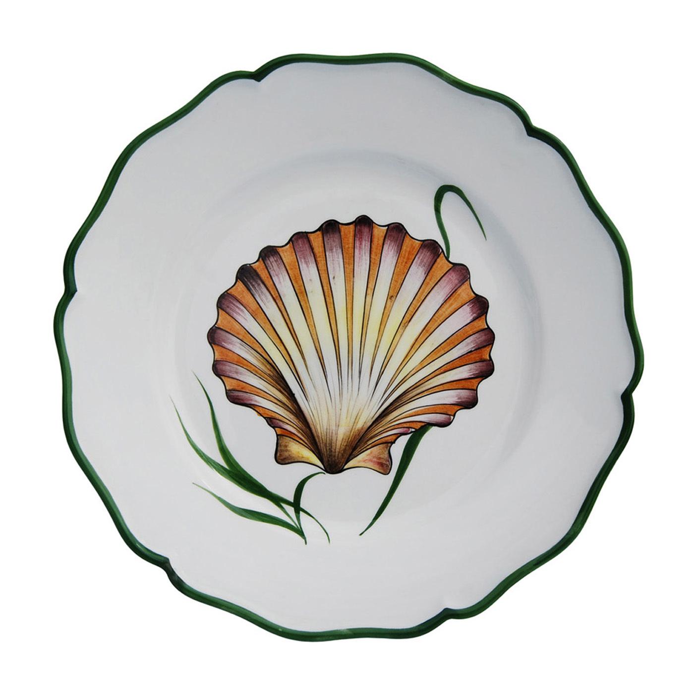 Decorative shell motifs on an elegant white background are set against a dark green rim in this set of 4 ceramic plates entirely handcrafted and hand painted by expert artisans in the Northern-Italy town of Este. This set matches other sea-life