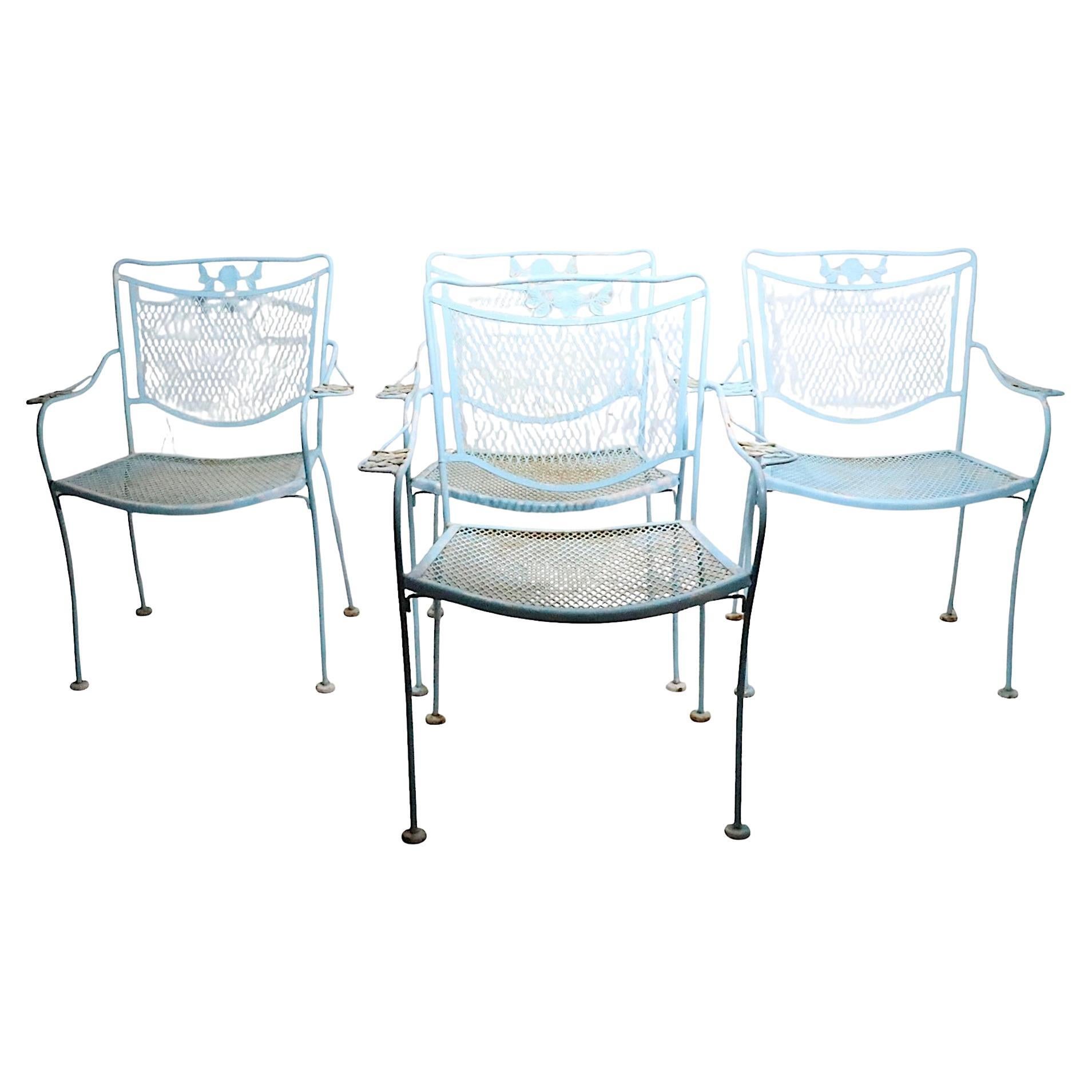 Set of Four Garden Patio Poolside Wrought Iron Dining Arm Chairs by Woodard Co.