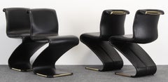 Set of Four Gastone Rinaldi Black Faux Leather and Brass Z Chairs, 1970s