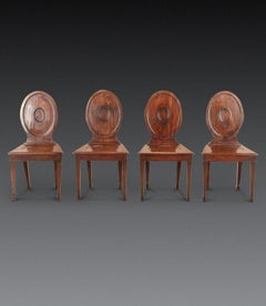 Set of Four George III Mahogany Hall Chairs