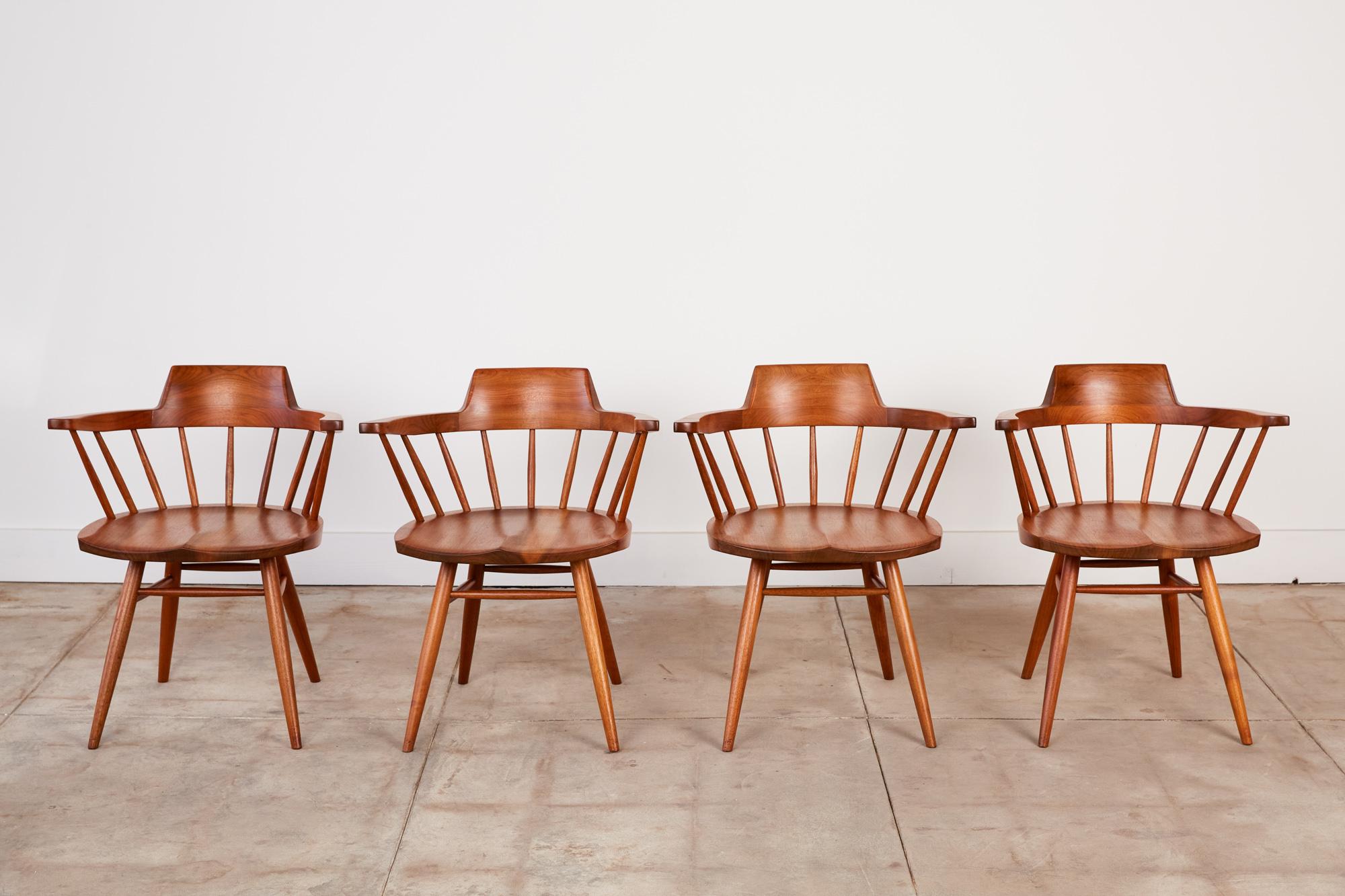 Mid-Century Modern Set of Four George Nakashima Black Walnut Captain's Chairs