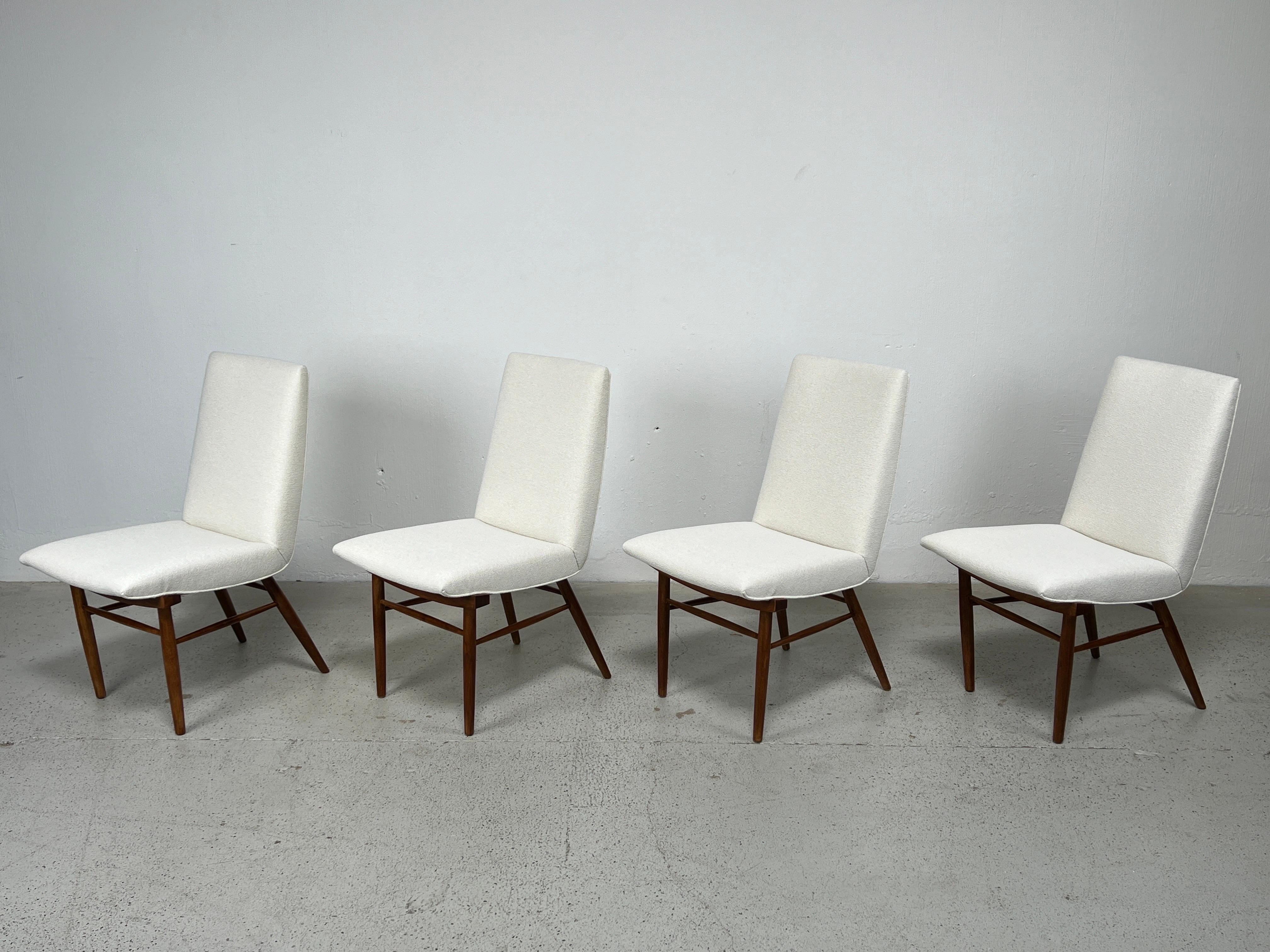 A rare set of four model 206 dining chairs designed by George Nakashima for Widdicomb. A matching fifth chair available separately. 