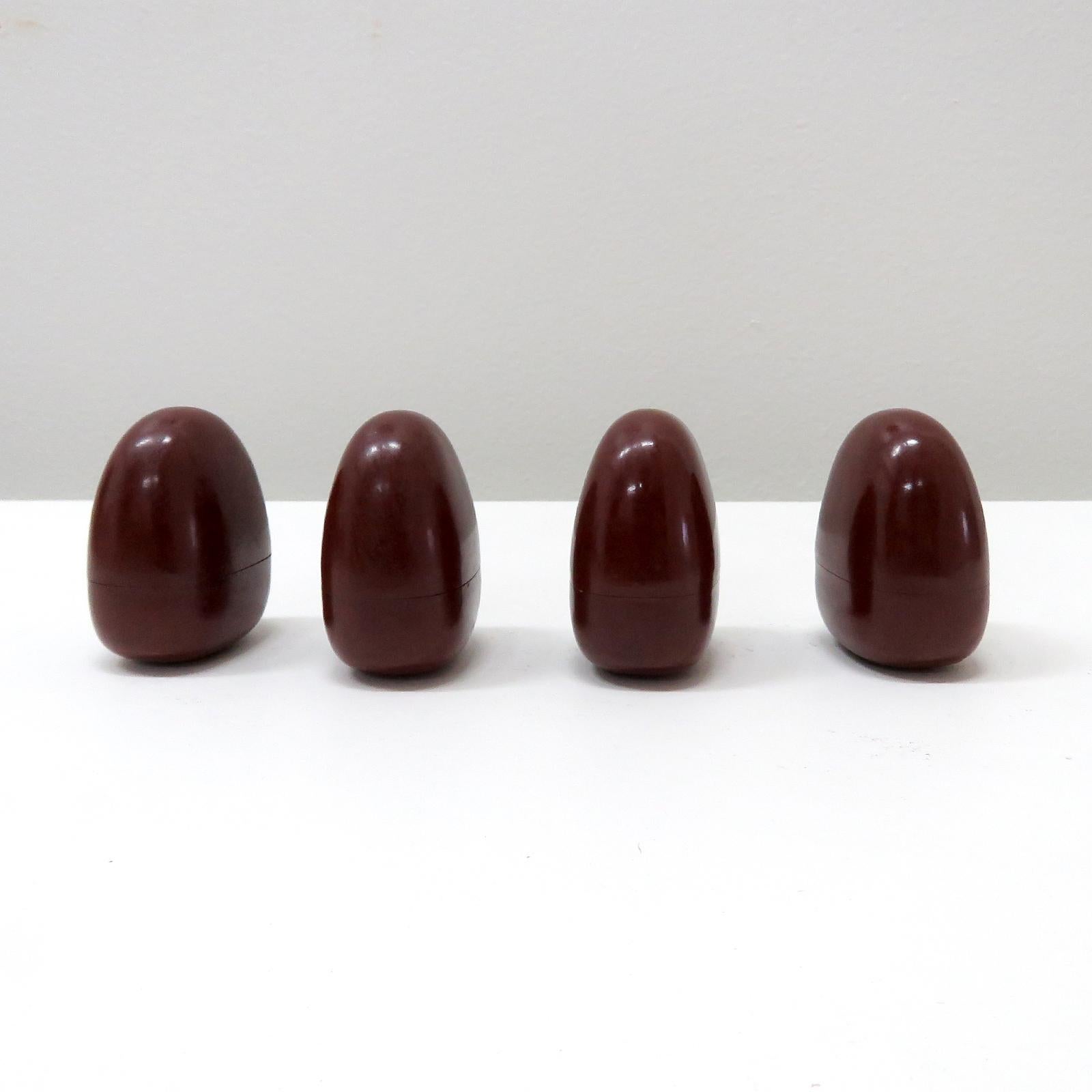 Sculptural darning eggs in maroon bakelite, Germany 1930, two part eggs (for easy storage of needles & thread), marked with a DRP (Deutsches Reich Patent) number.