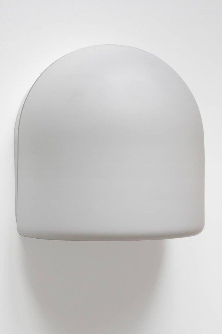 Set of four Minimalist white matt glass wall flush mounts / sconces.

Lamp sockets: 1x E27 (US E26)
Price for set.