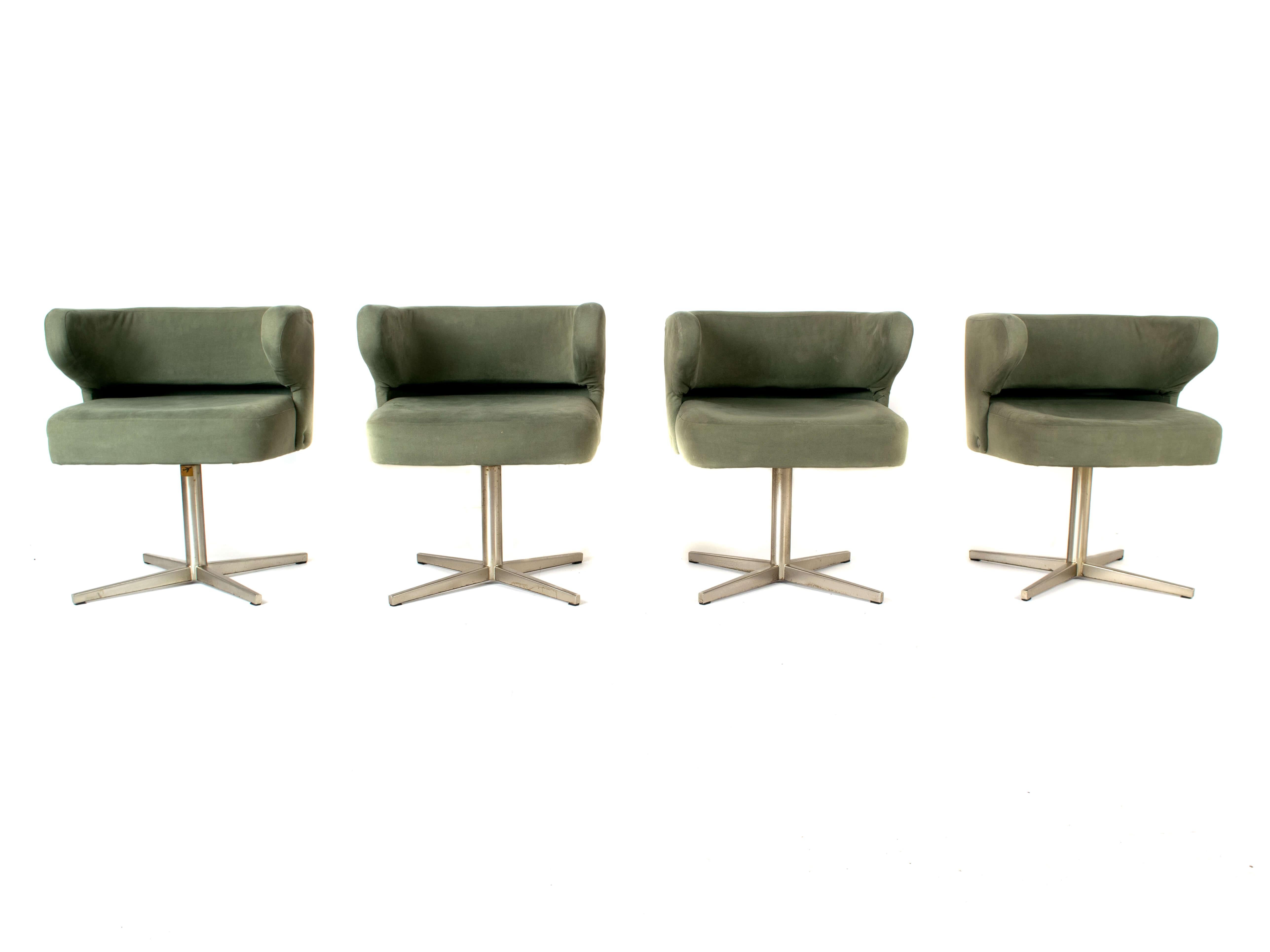 Amazing set of four Gianni Moscatelli swivel 'Poney' chairs for Formanova, Italy, 1970's. These four chairs have an amazing color fabric in green/grey color that is in very good condition (a reference photo of the fabric is added). Furthermore, it