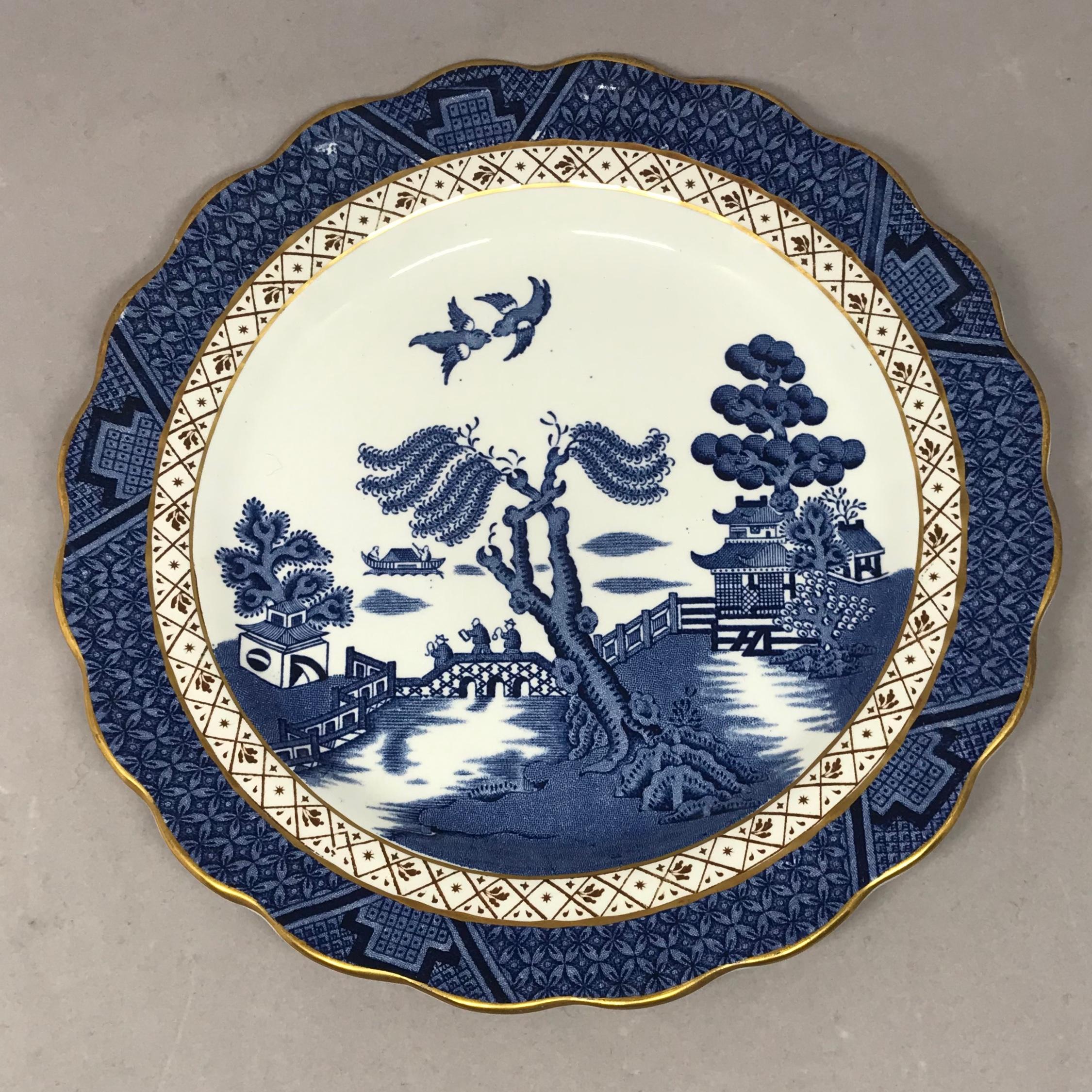 English Set of Four Gilded Blue and White Chinoiserie Dessert Plates