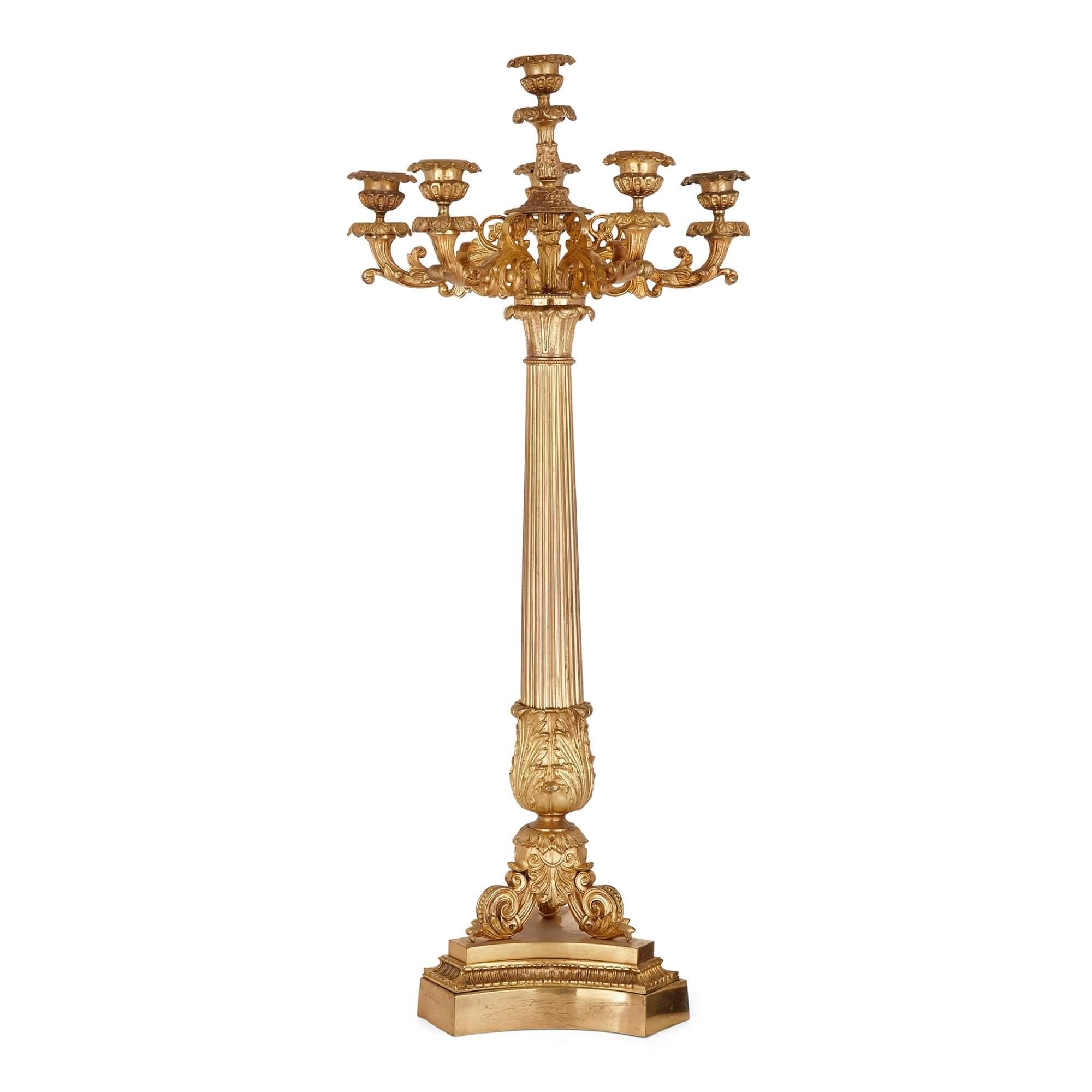 Set of four gilt bronze table candelabra by Picard
French, 19th century
Measures: Height 69cm, width 28cm, depth 28cm

The fine candelabra in this set are crafted form gilt bronze in an elegant late-nineteenth century neoclassical style. Each