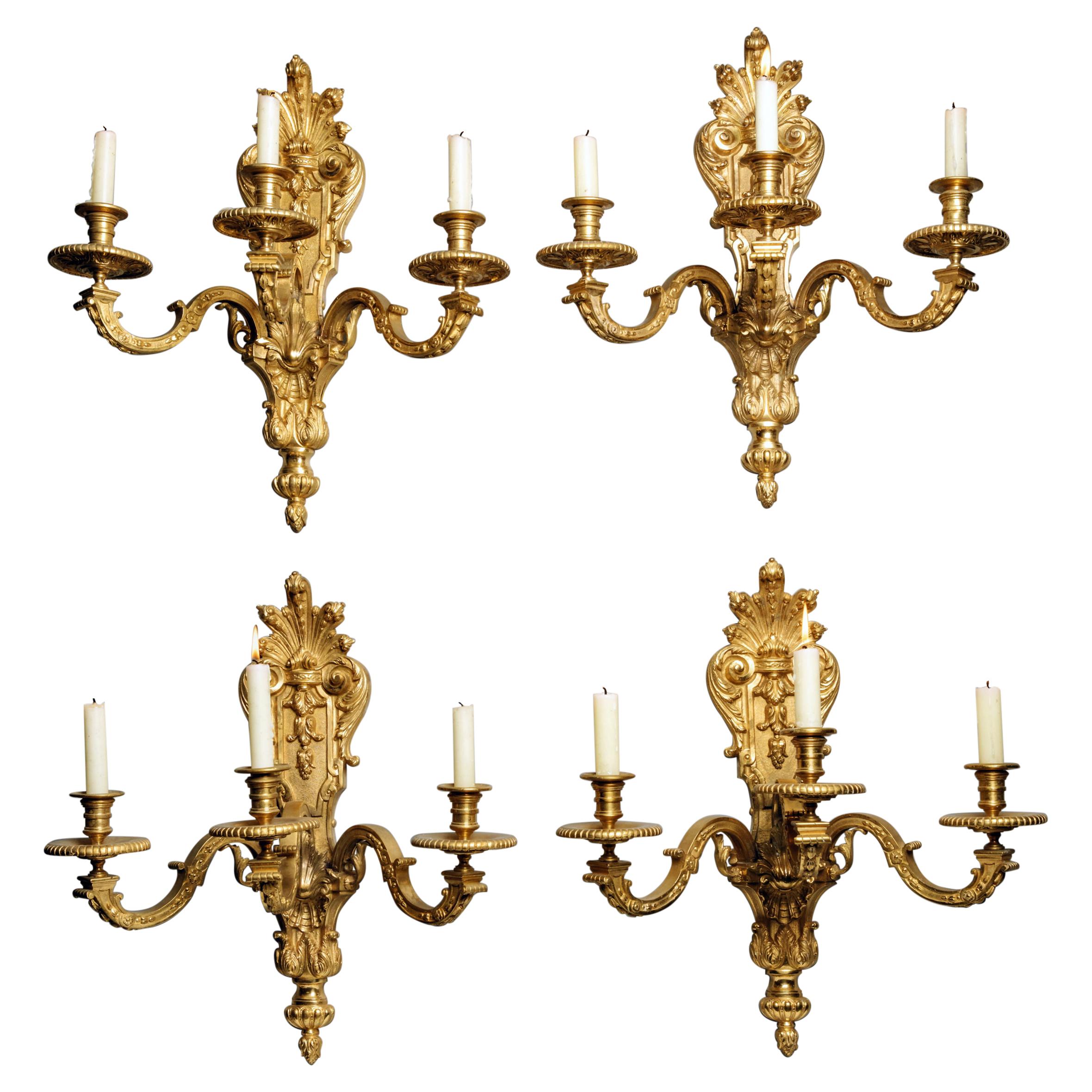 Set of Four Gilt-Bronze Wall Appliques For Sale