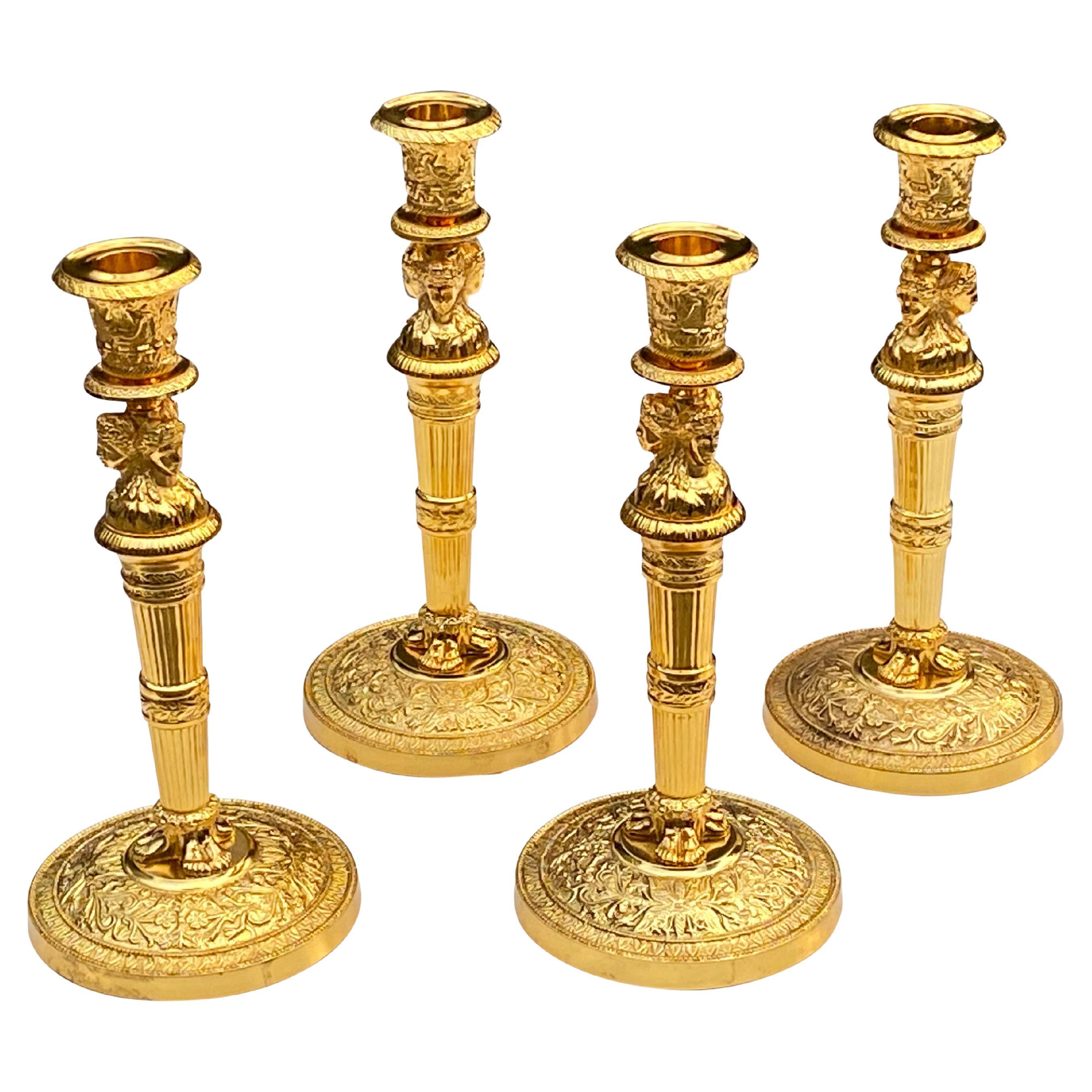 Set of Four Gilt Metal Empire Style Candlesticks For Sale