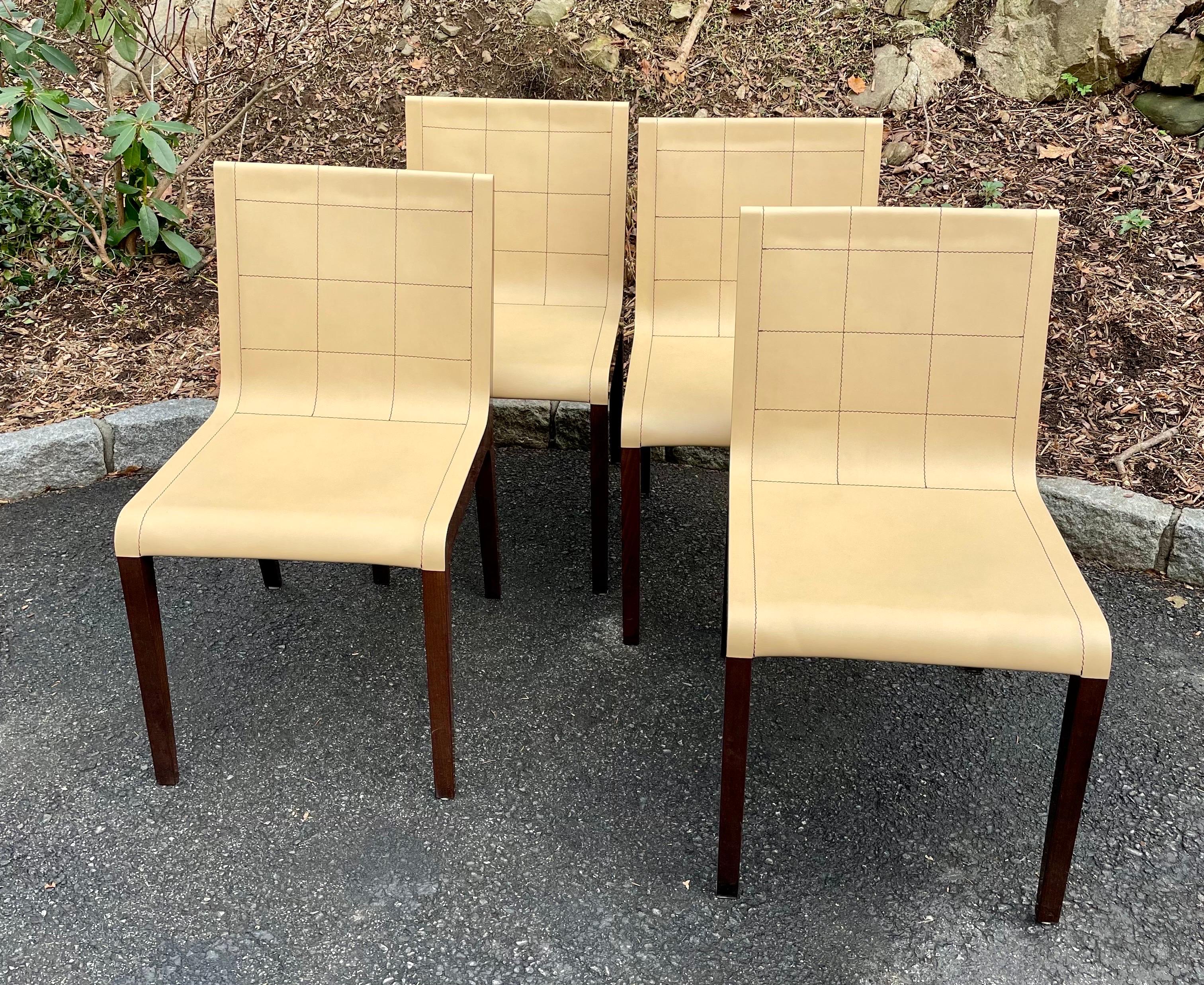 Beautiful set of 4 Giorgio Soressi for Pietro Costantini sand colored leather dining chairs with high polished wood frames, Italy.