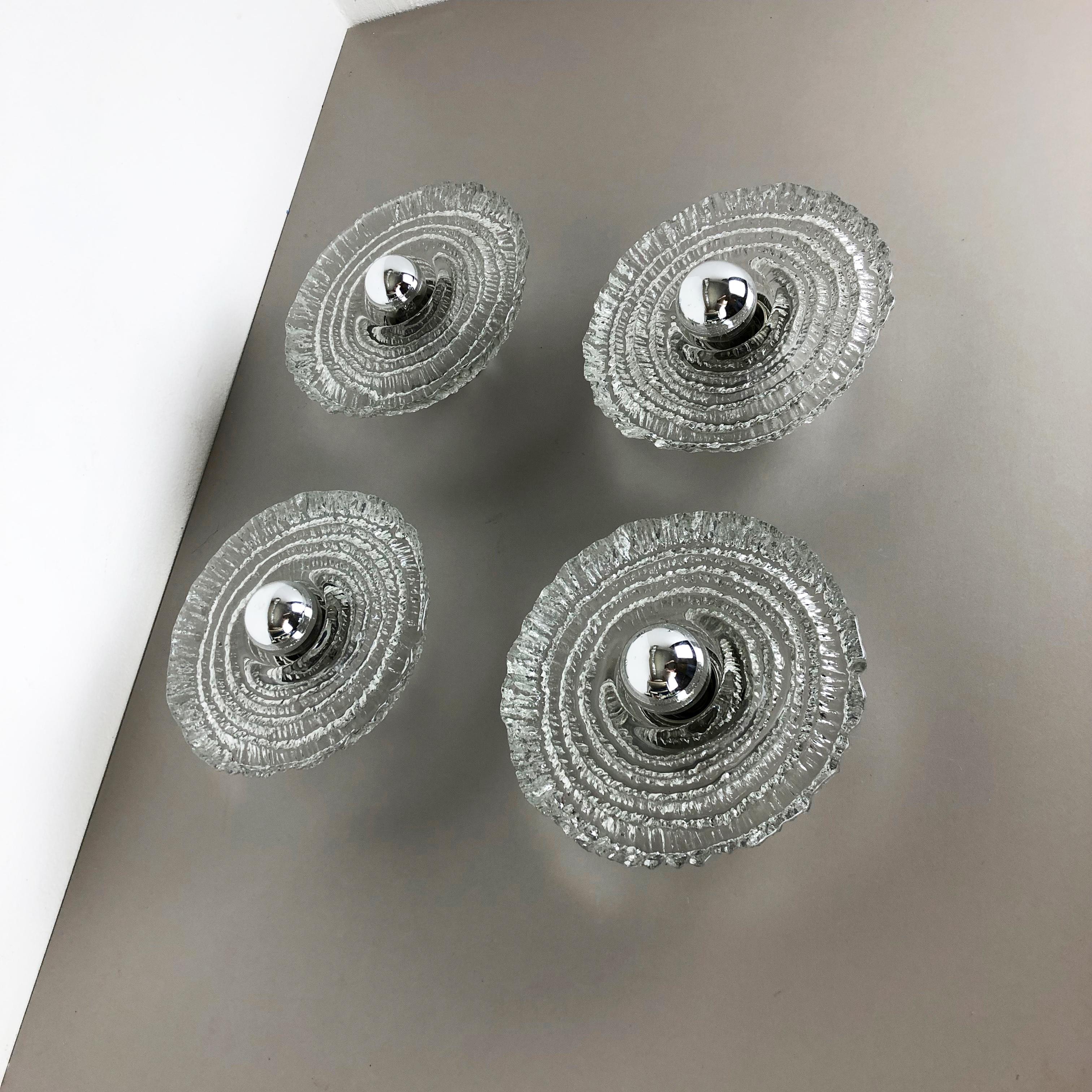 Article:

wall light set of four


Producer:

Peill and Putzler, Germany


Origin:

Germany



Age:

1970s



Original 1970s modernist German wall Light set made of glass and metal. These super rare wall lights were produced in
