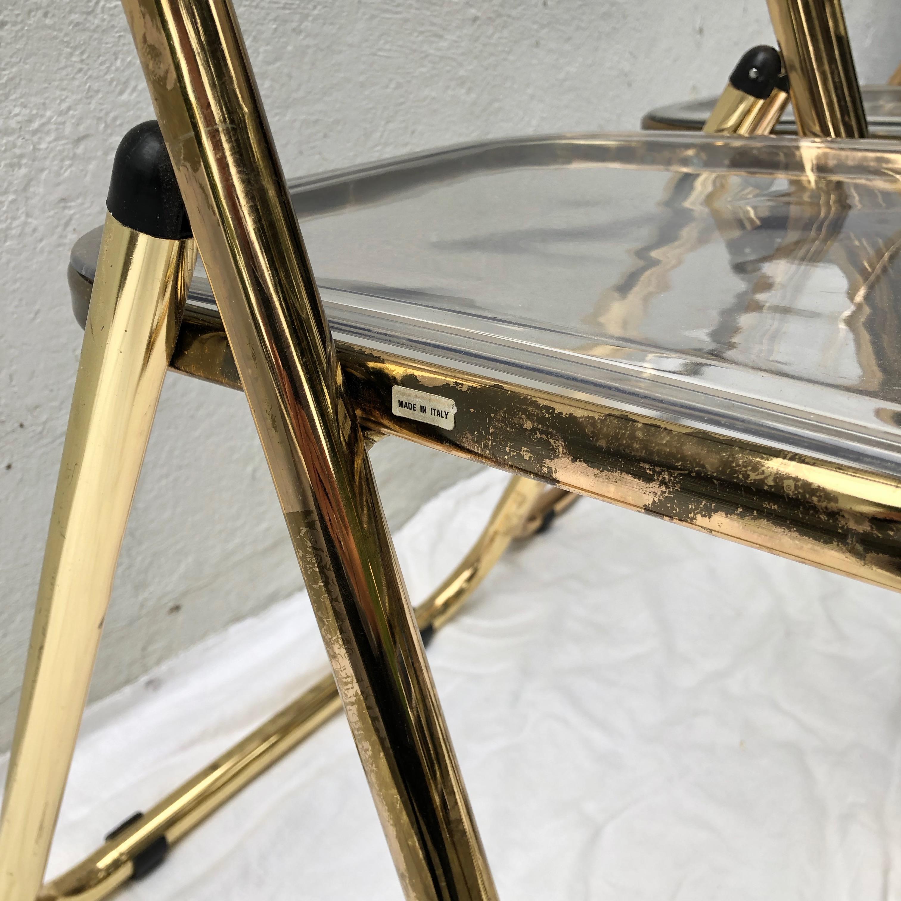 Set of Four Gold Plia Folding Lucite Chairs in the Style of Giancarlo Piretti In Good Condition For Sale In East Hampton, NY